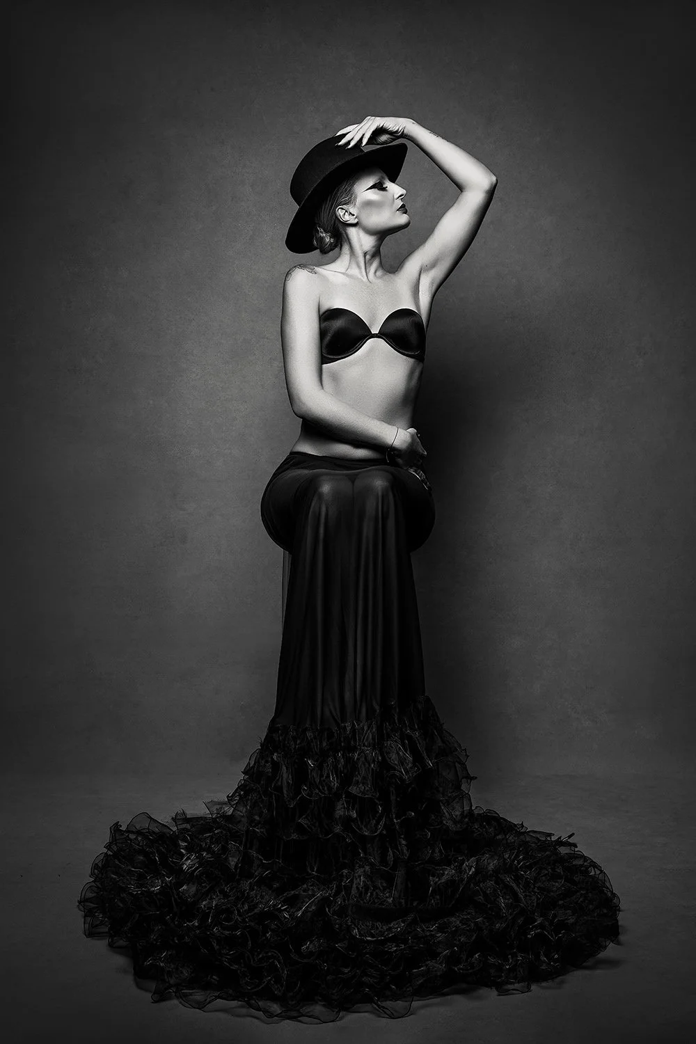 Fine art black and white portrait by the leading luxury portrait photographer in Innsbruck, Tirol Austria. Editorial studio photography for women in the European Alps.