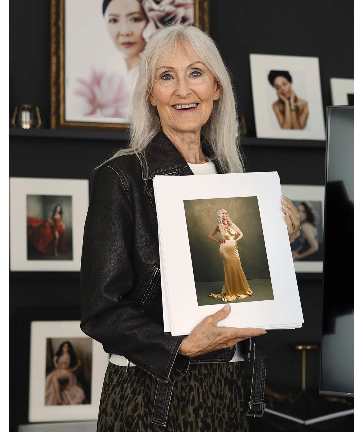 Woman-holding-her-Matted-Portraits-from-a-portrait -session-with-Mayumi-Acosta-Photography.jpg