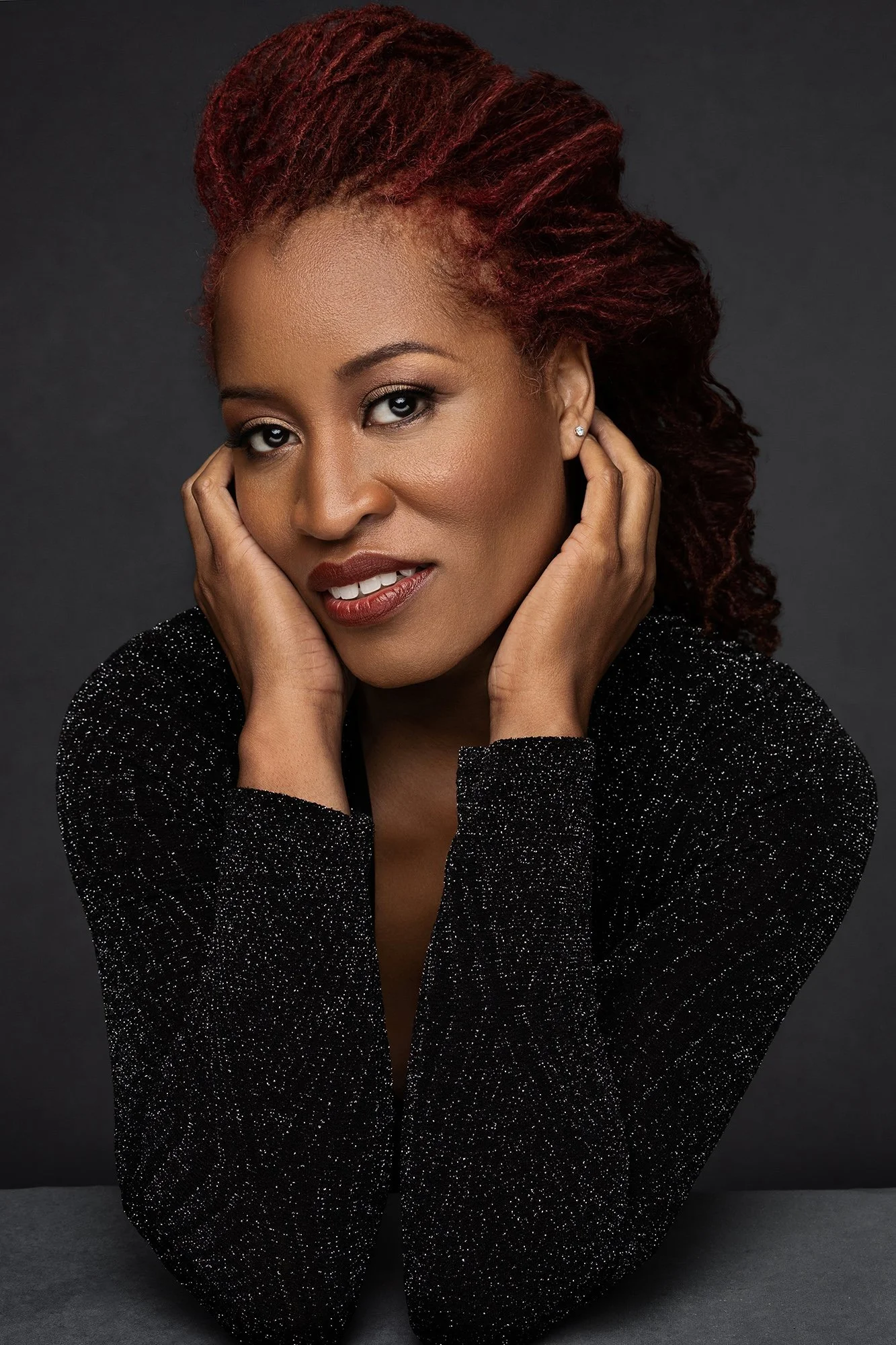 Sophisticated close-up portrait of a confident woman over 40 photographed in a luxury beauty portrait session in Tirol.