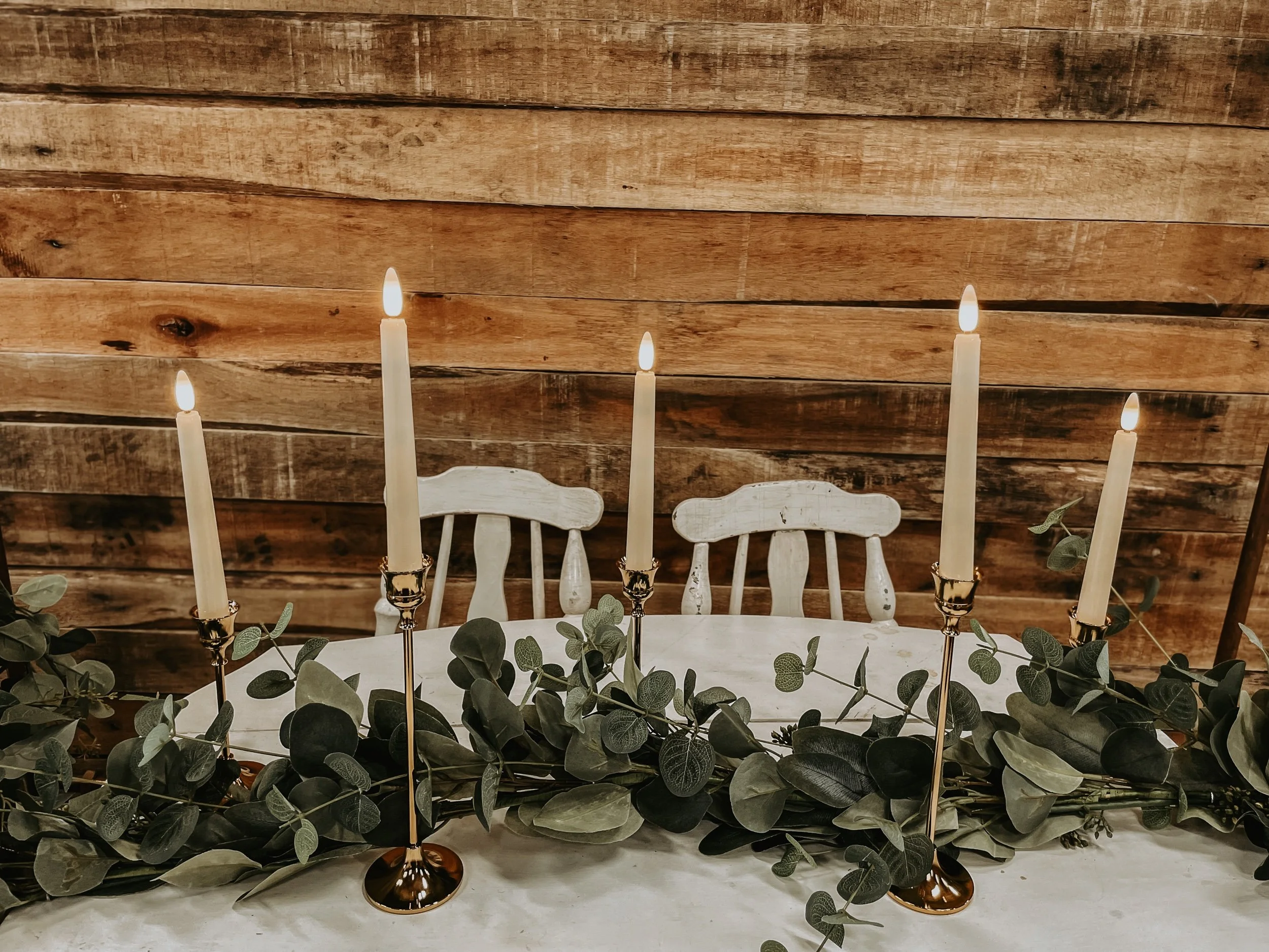 **Gold Candlesticks (9", 7", 6") - $2 each
**Flameless Taper Candles - $2 each