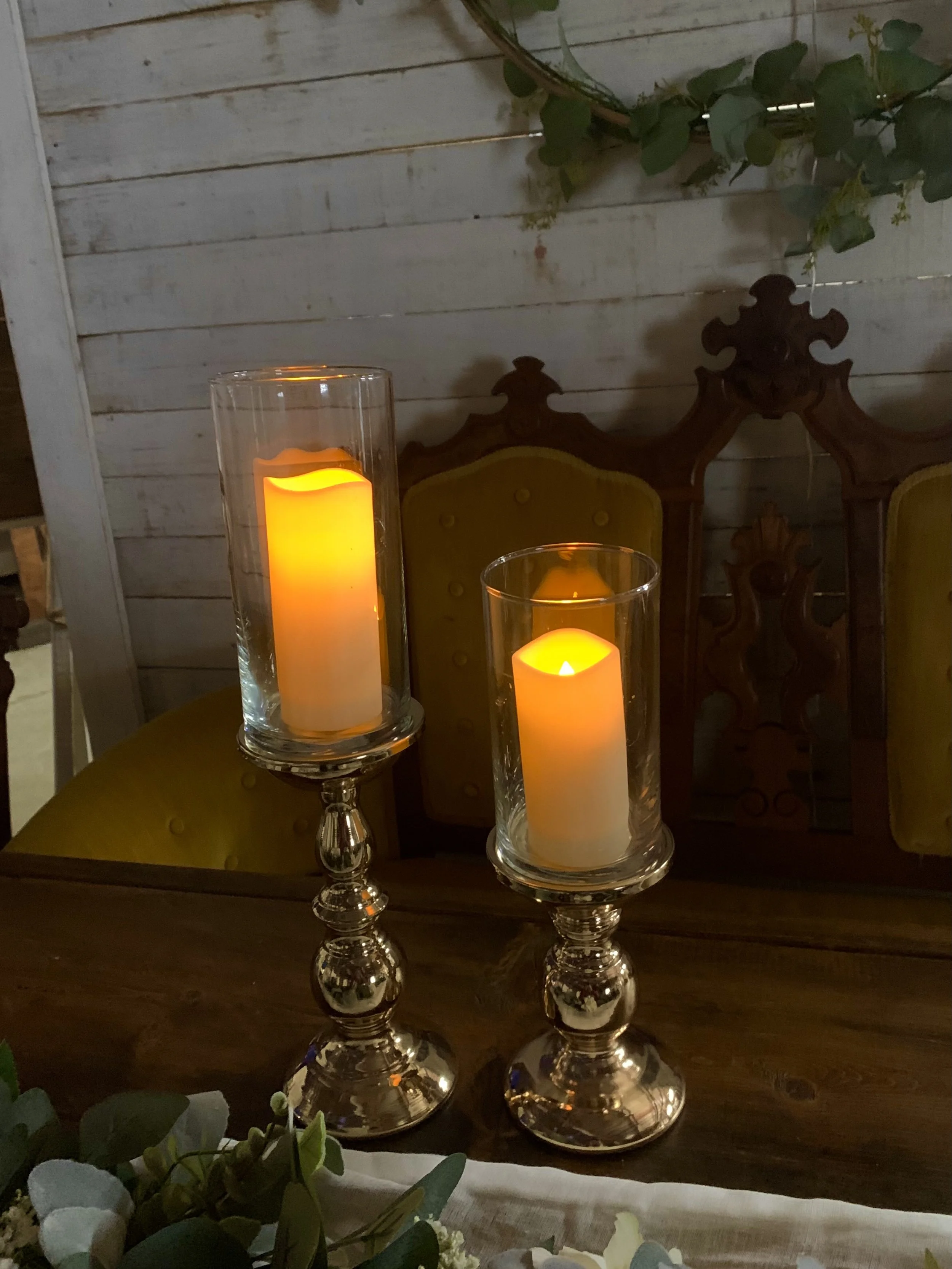 Gold Pillar Candle Holders - $4 each
 (9" & 6" Tall)
Add Vase - $1
Add Candle - $1.50