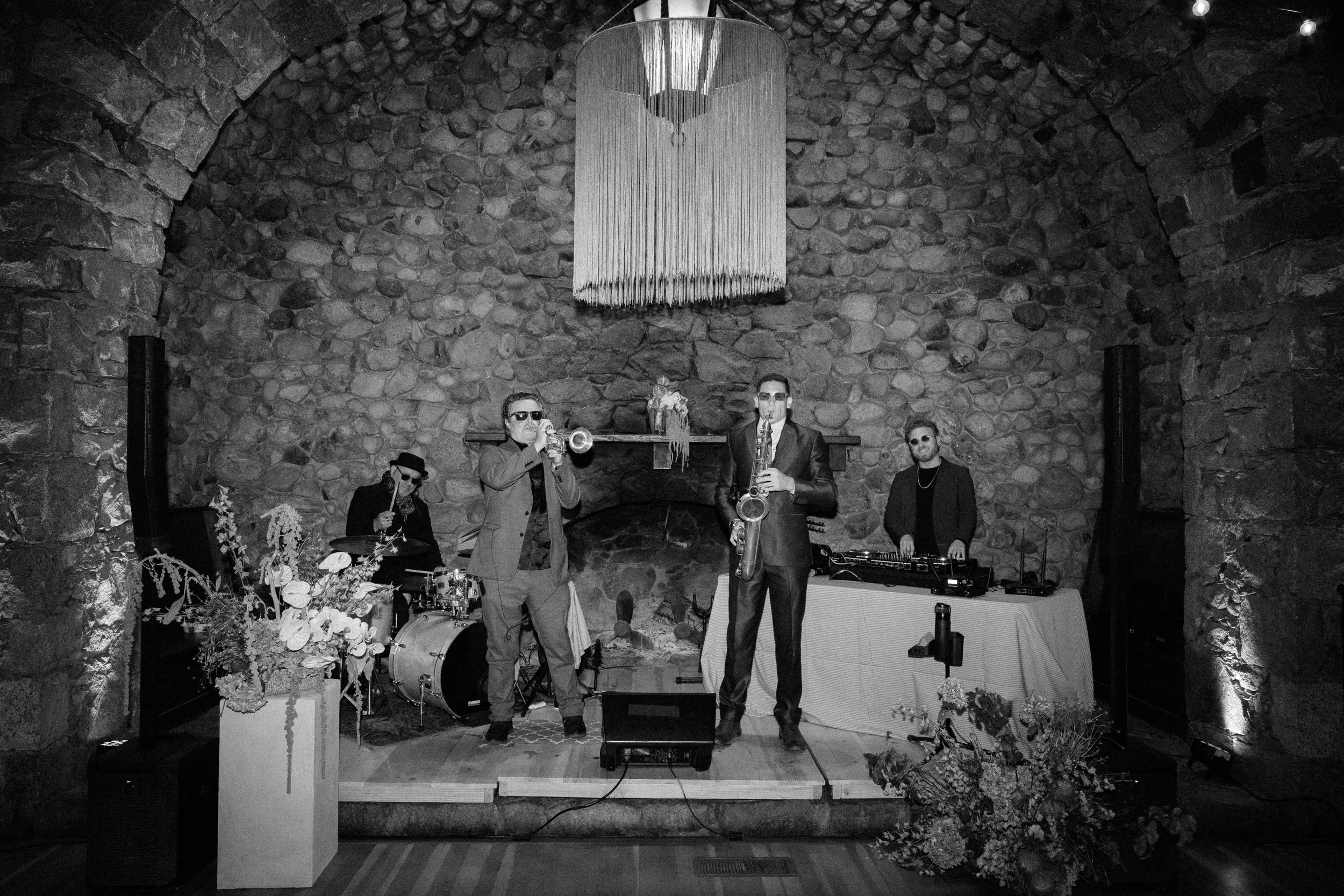 wedding band and stage with fringe decor