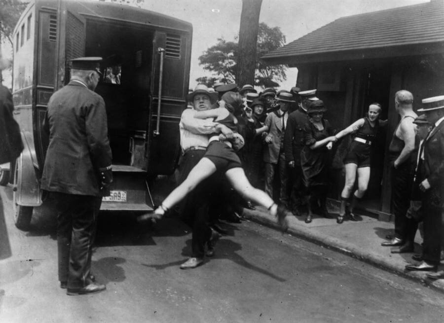 Women in Chicago being arrested for wearing one piece bathing suits without the required leg coverings.