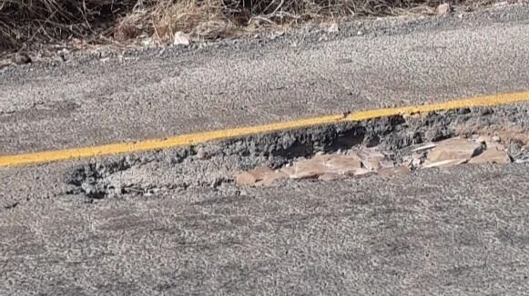 One of the more significant of the 34 potholes along the co-joined M385/Thousand Hills Street/R103