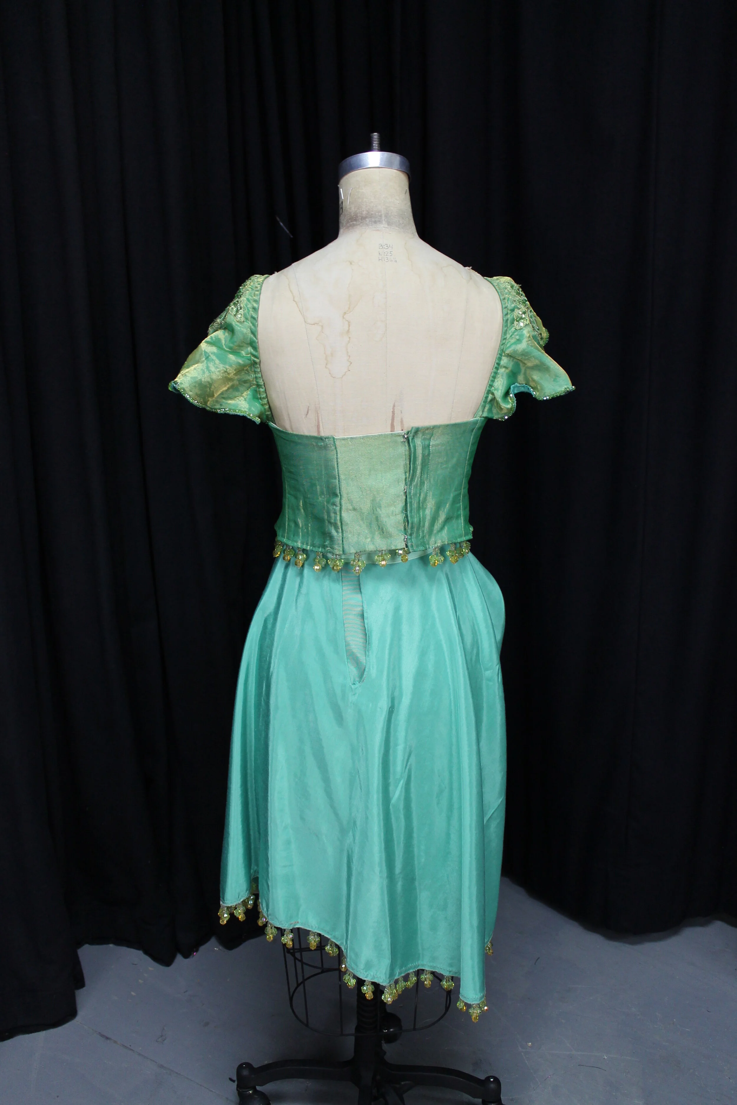 Back View of Princess Nekaya Dress
Utopia, Limited
Costume Designer: Amber Cook