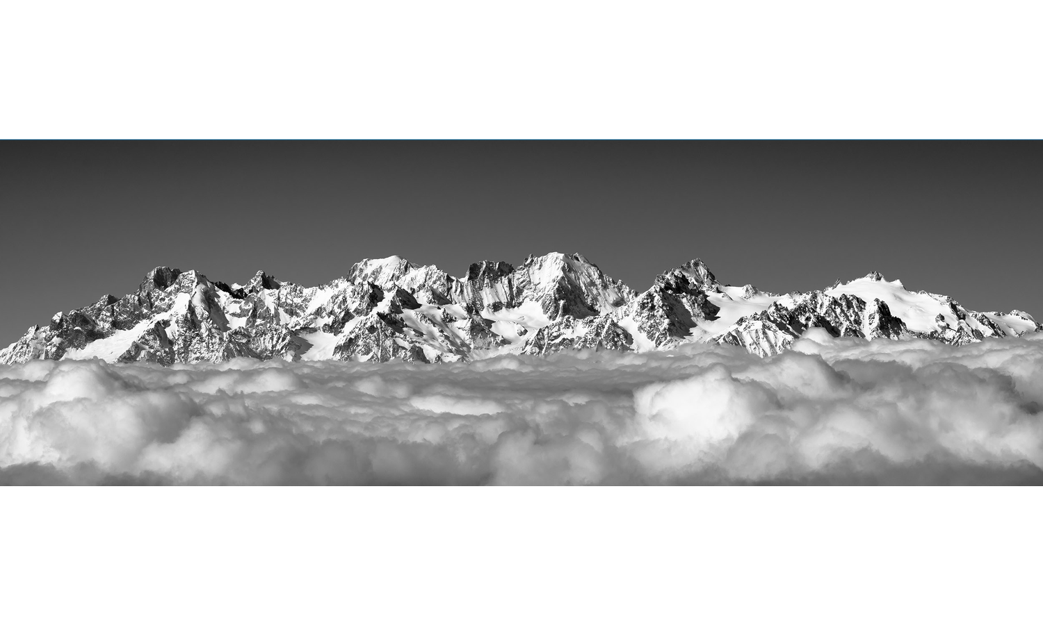Verbier Panorama - B & W shown at 90 x 30cm (Panoramic) in a living room