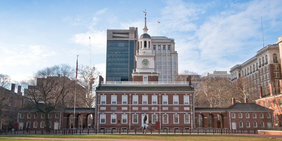 This photograph depicts Independence Hall. This building served as the setting for many important moments in American history - such as the signing of the Declaration of Independence and the ratification of the Articles of the Confederation.