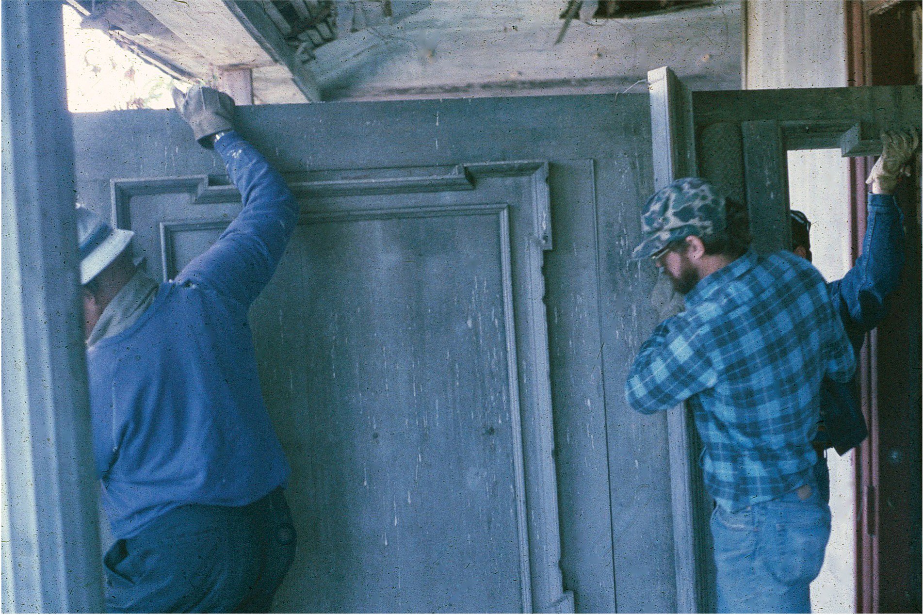 2 - Moving mantle out of shack in Lyles.jpg