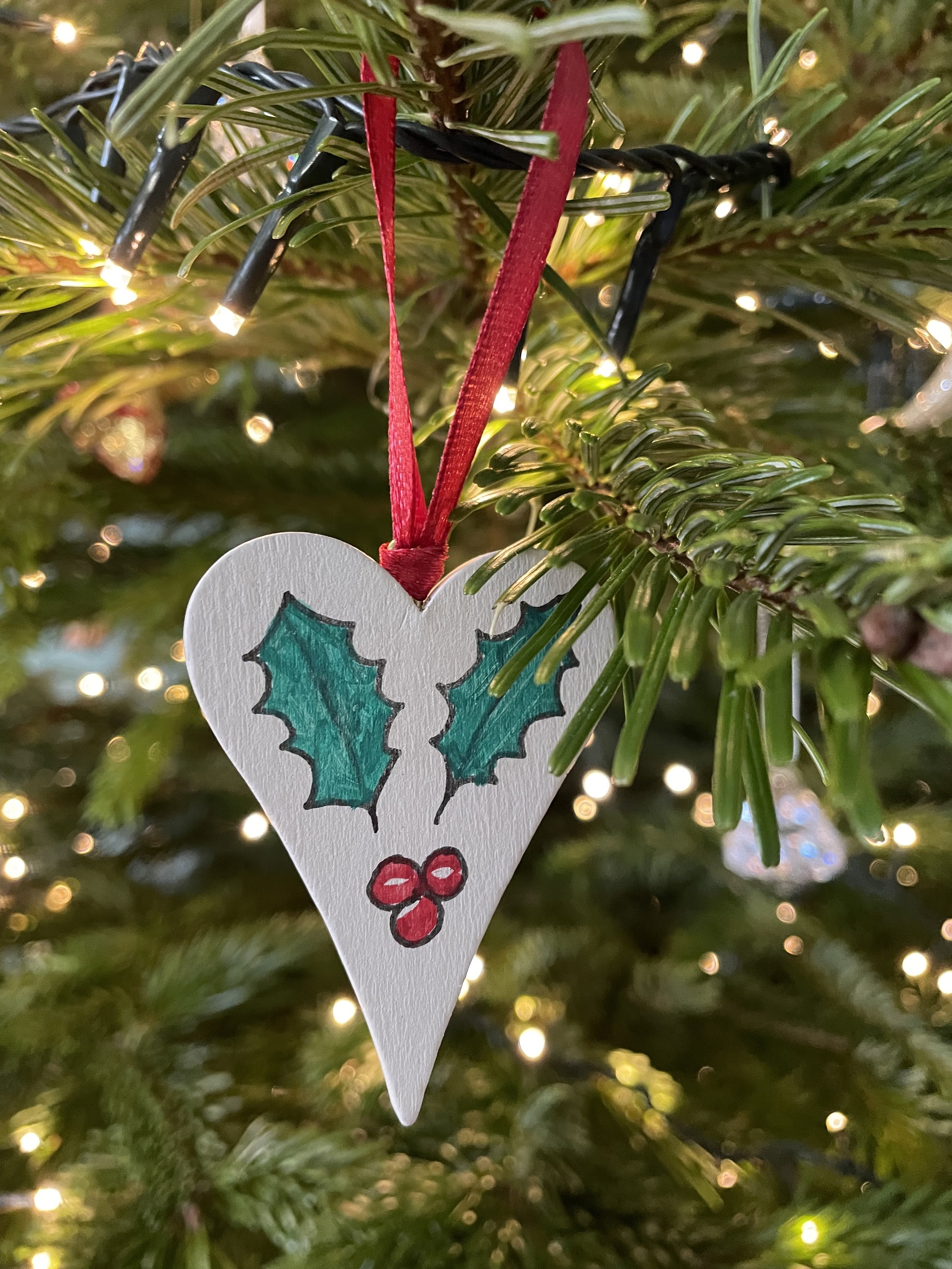 IMG_1402 Wooden Holly on Tree.jpg