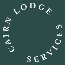 Logo with circle of text reading 'Cairn Lodge Services'