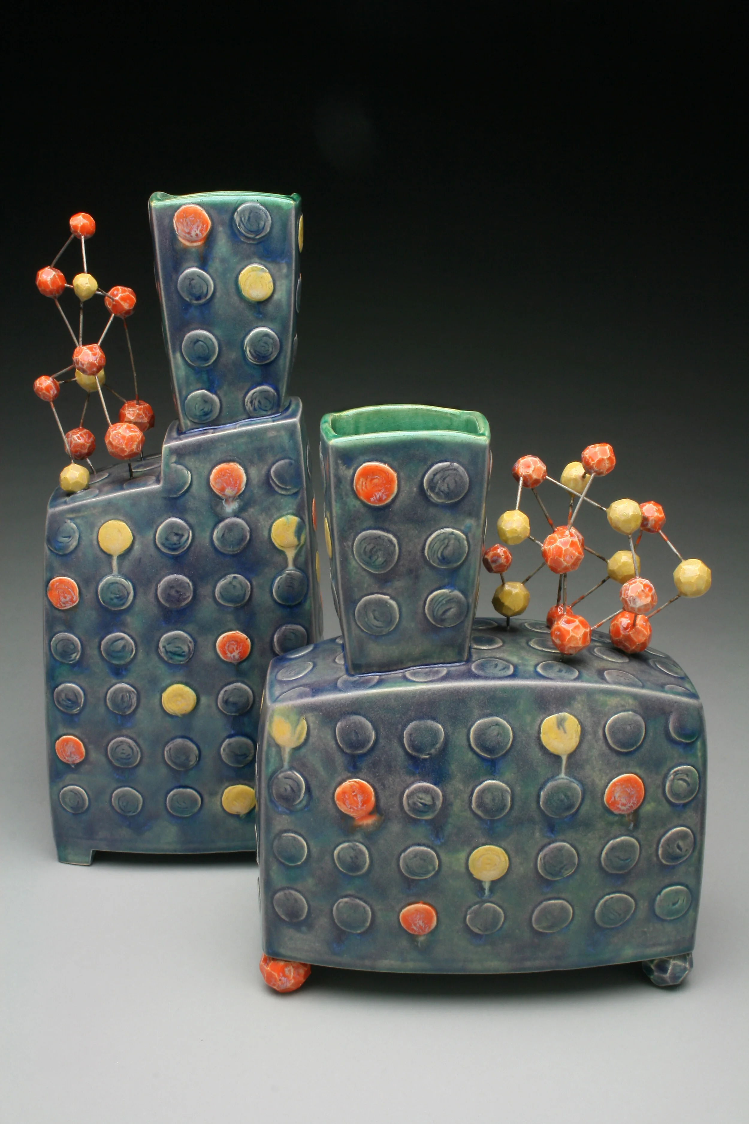 Slab-built bud vase pair, kanthal wire and ball detail, 2011