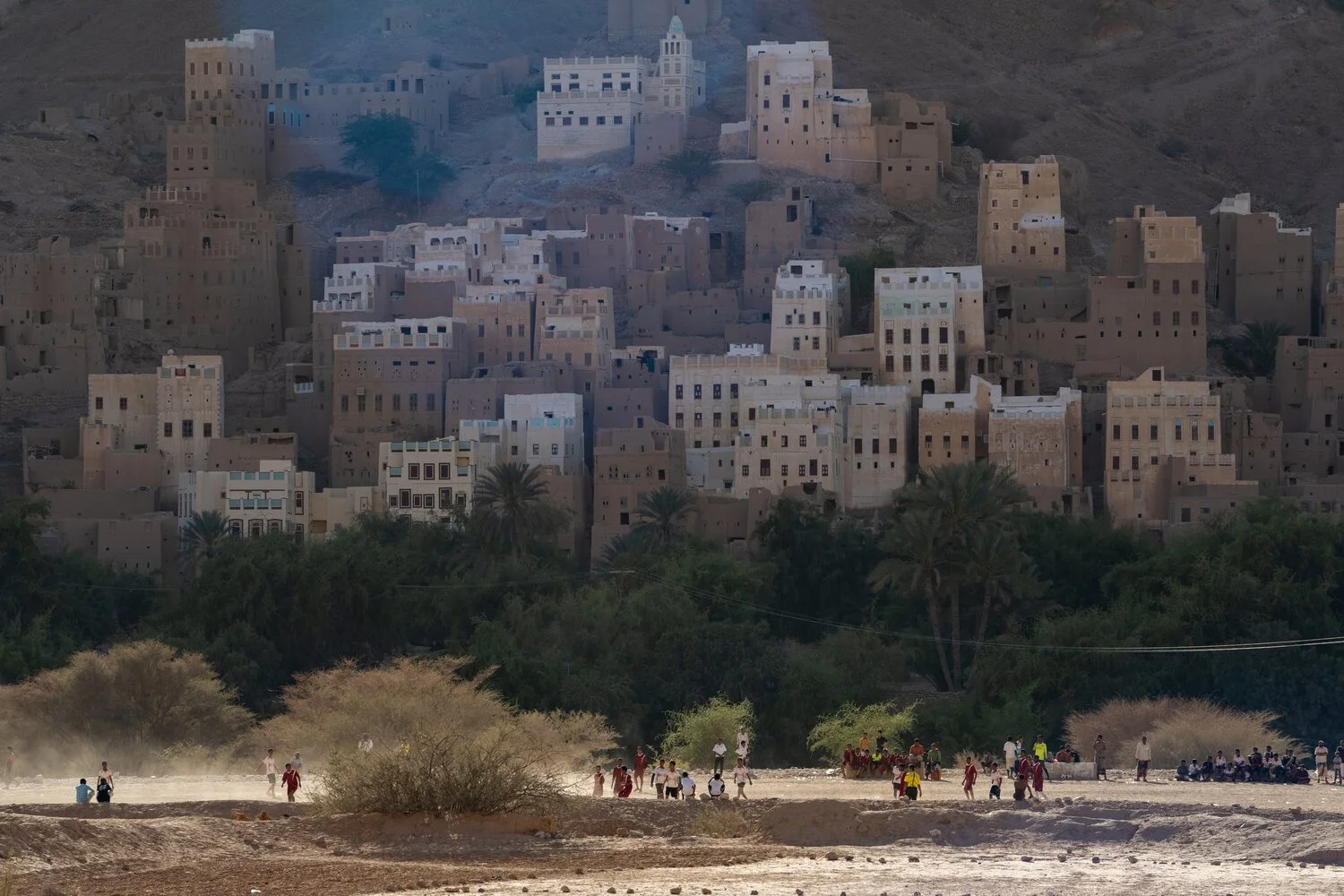 Young men gather for soccer games in the town of Al Khuraibah on the southern side fo Wadi Doan.