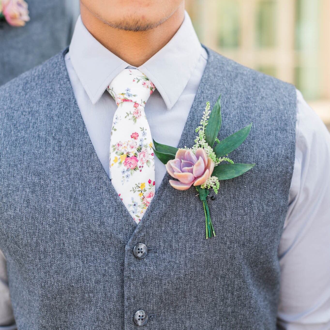 Succulents make such great boutonni&egrave;res! Especially next to these fun floral ties! 
.
.
.
#dfwflorist #dfwweddings #dfwbride #dallasbride #fortworthbride #fortworthwedding