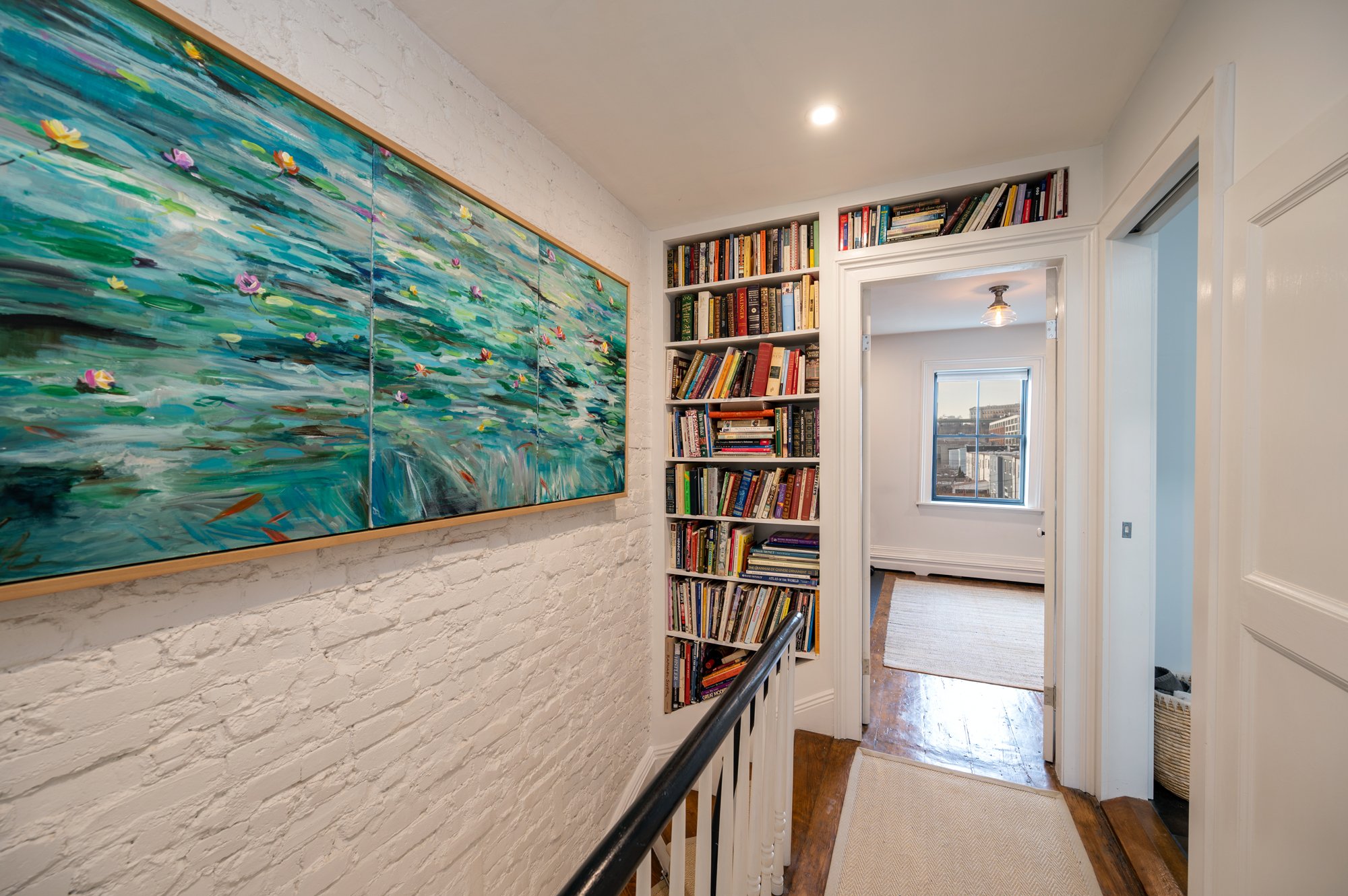 165 Coles - Bookcase - 3rd Fl.jpg