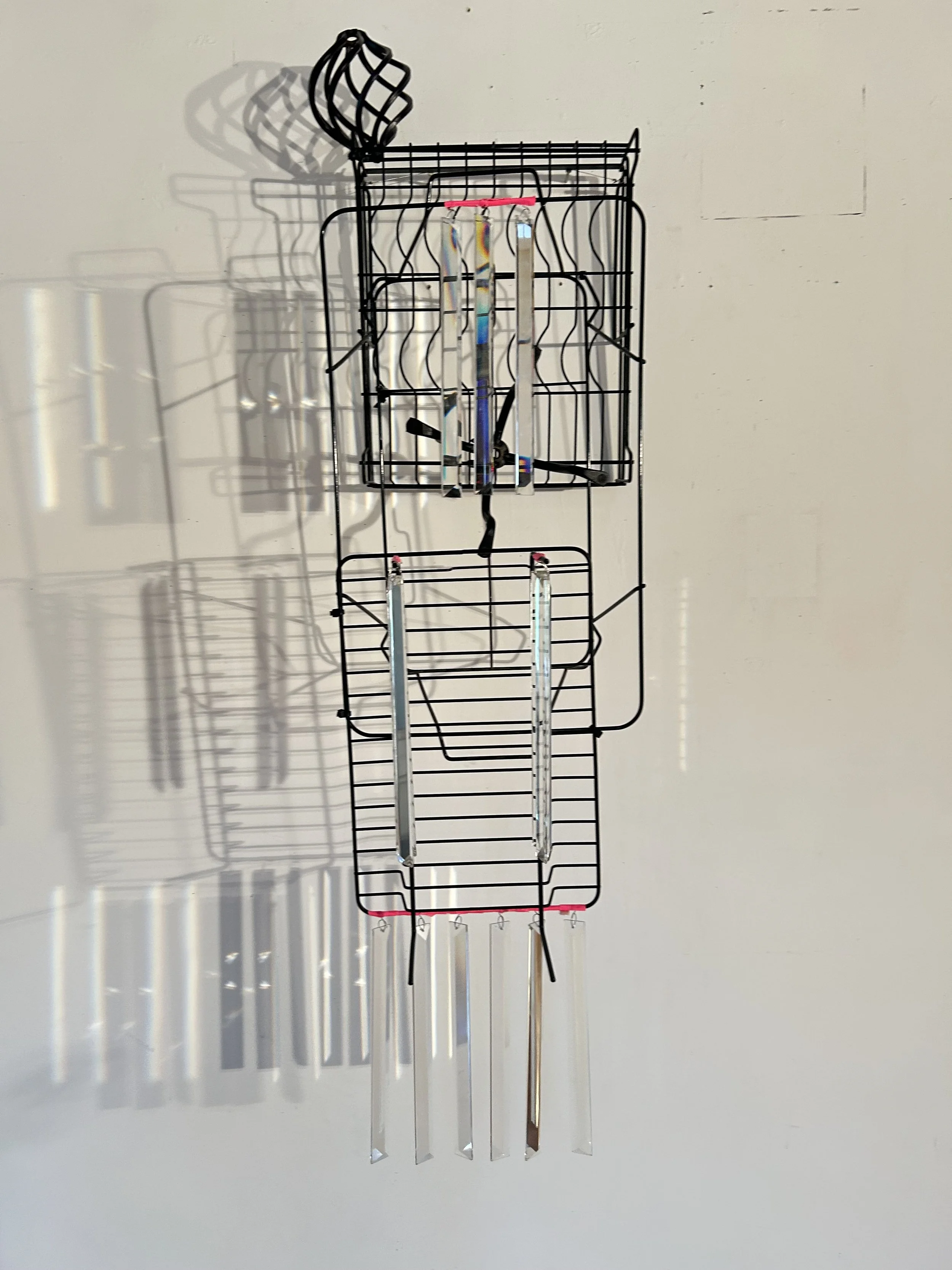 "Magic Whisper", 2025, found objects, zip ties, crystals, duct tape