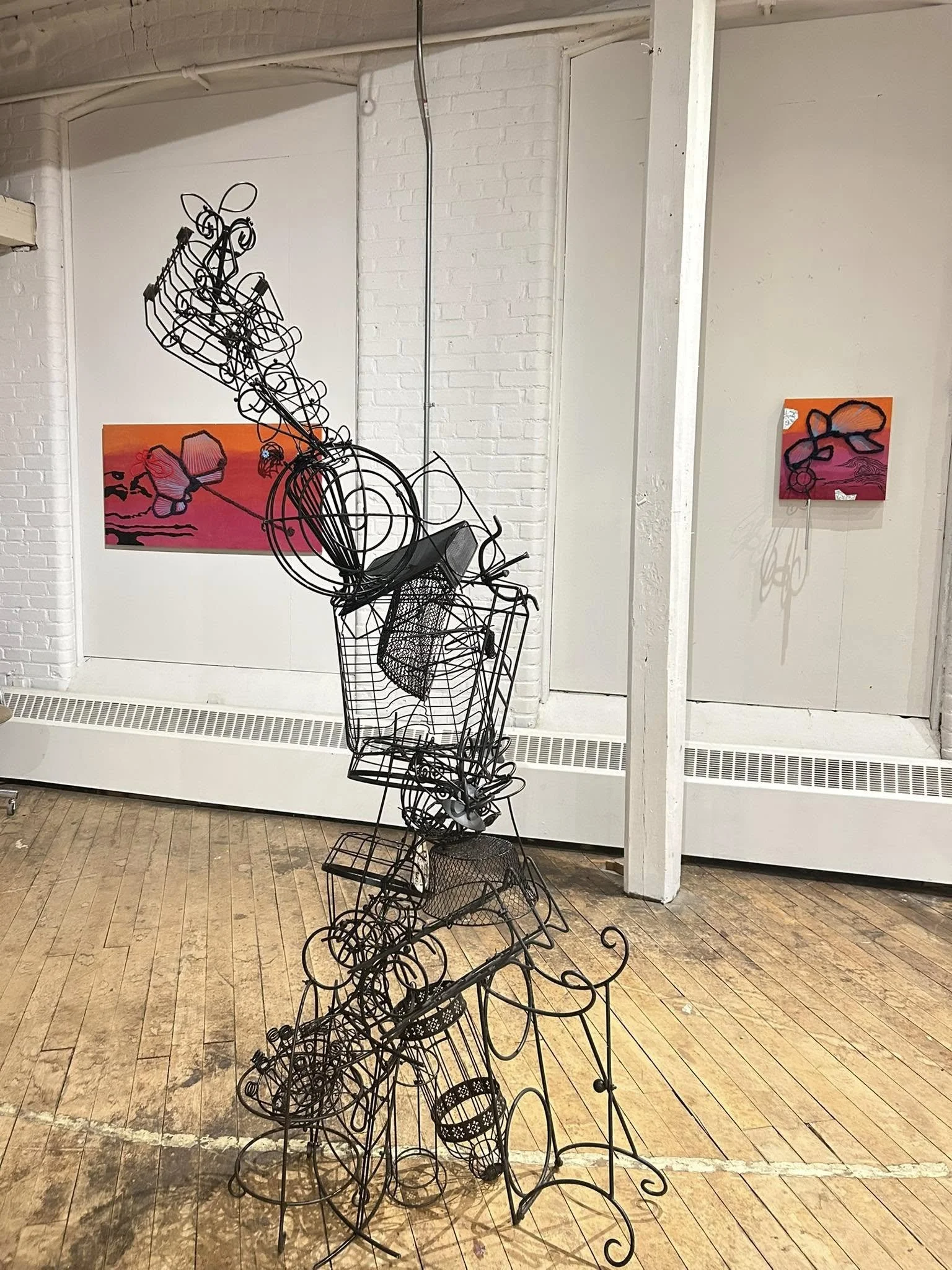 "Endless Vibration", 2025, found objects, zip ties, crystal, wire, 60" x 30" x 24"