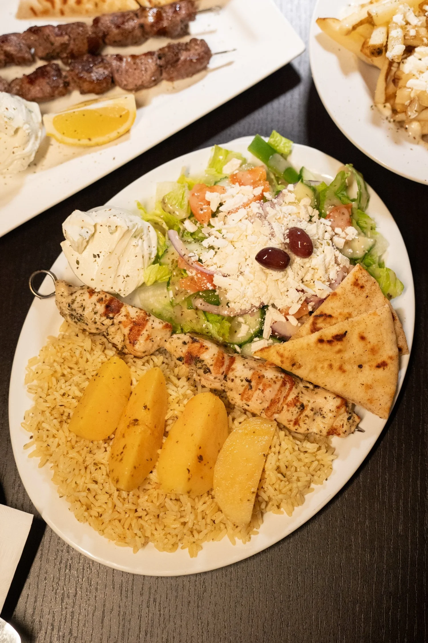 A Mediterranean souvlaki dinner plate at Classic