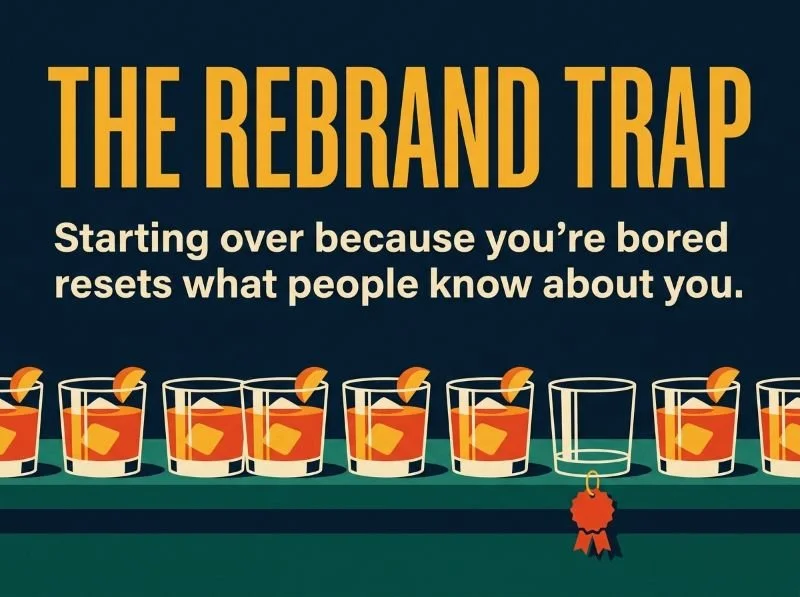 The rebrand trap: a row of full old fashioned glasses on a navy background with one empty glass wearing a price tag.