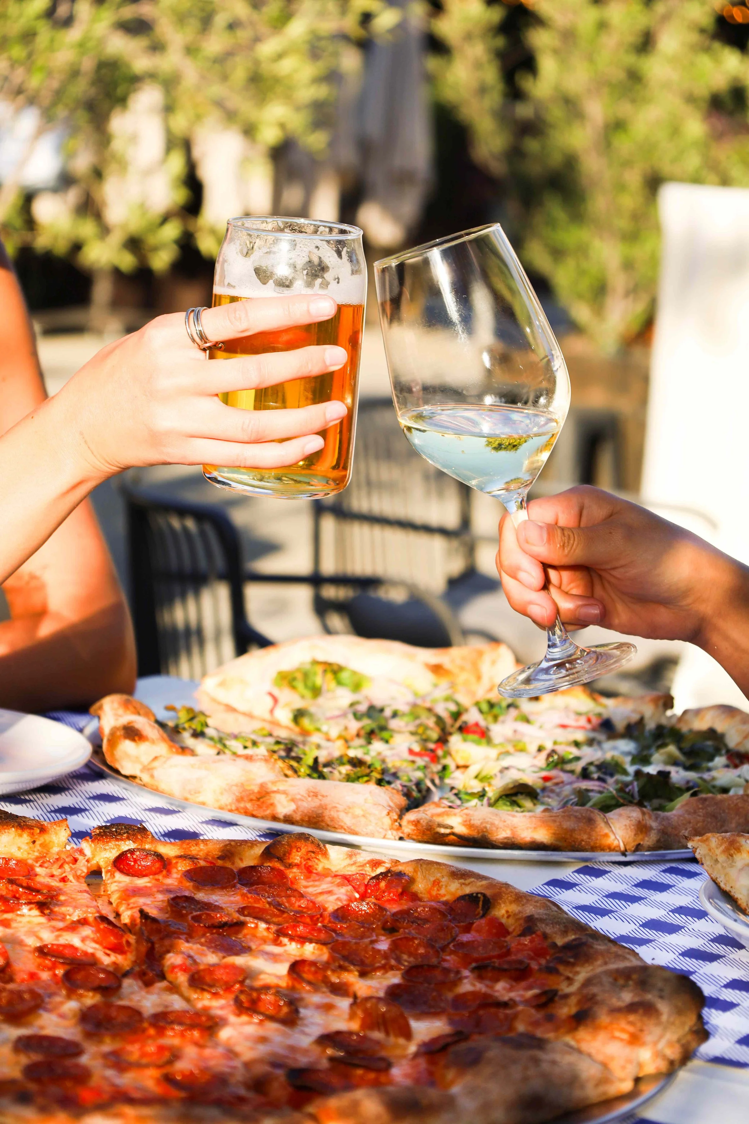 BEER AND WINE TOAST OVER PIZZA
