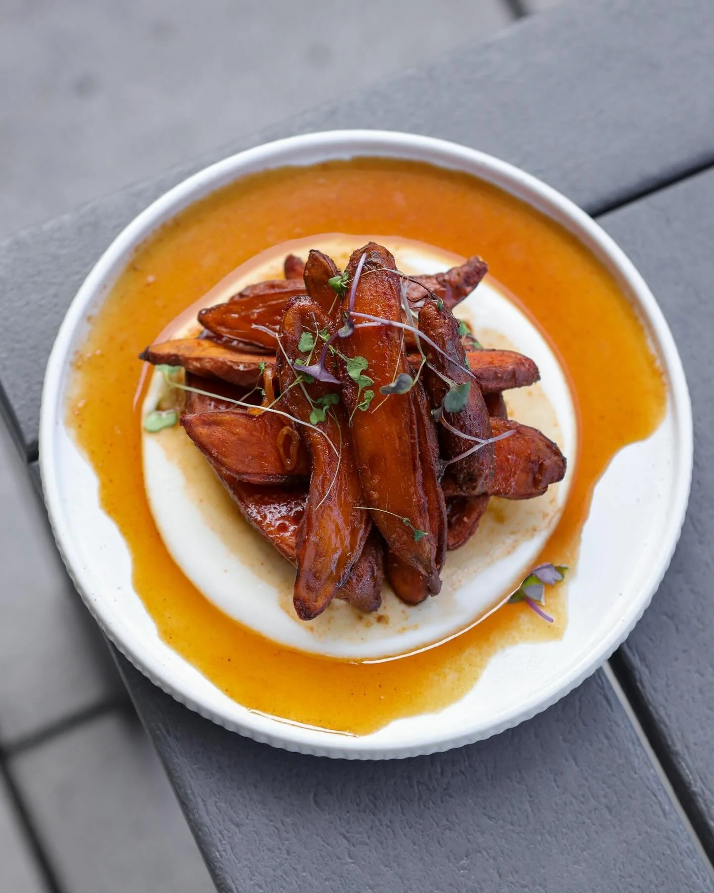 Crispy Sweet Potatoes 🍠 

&bull; Honeyed Sour Cream, Savory Spice, Salsa Macha, Baby Greens.