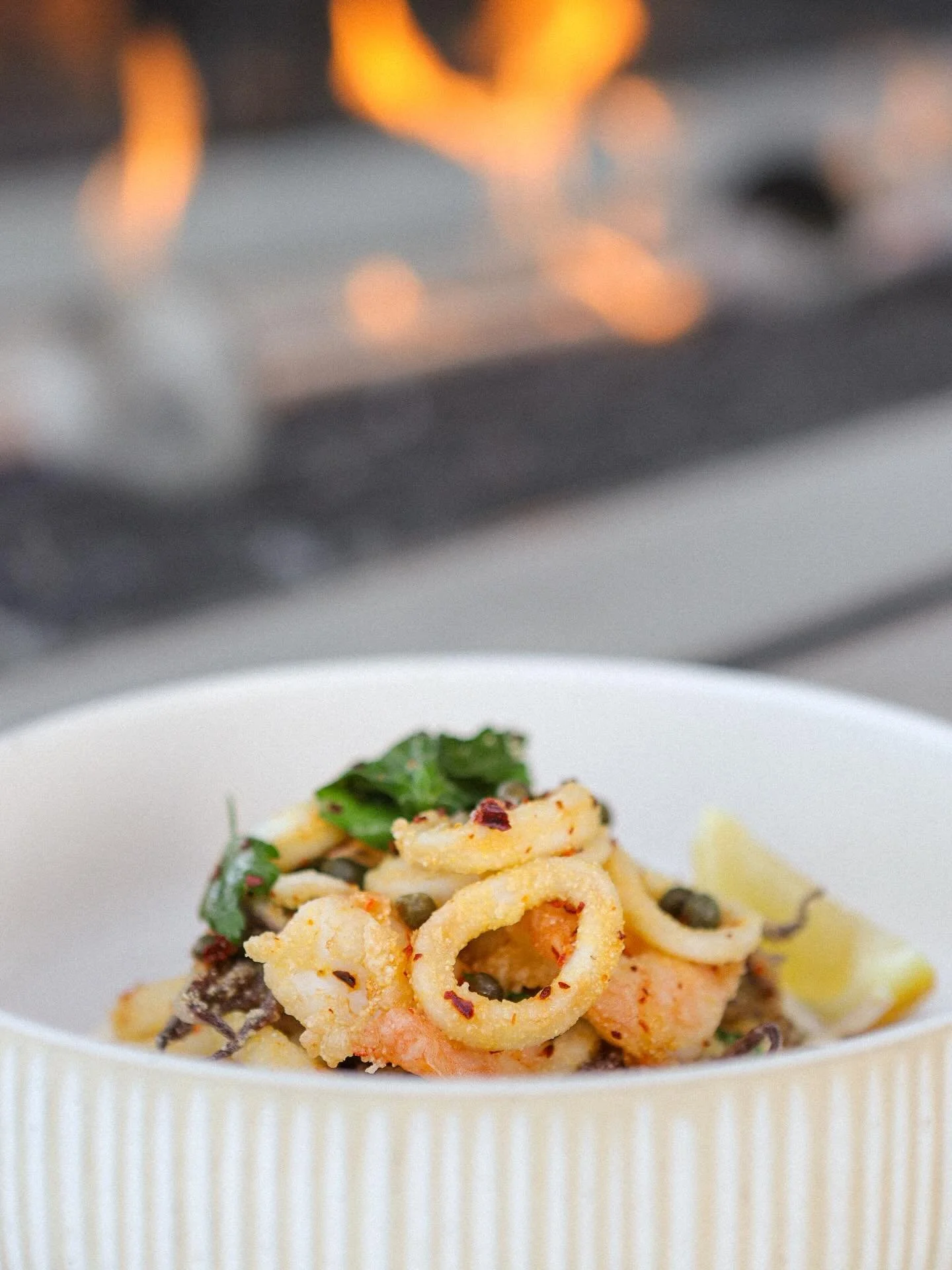 Shrimp &amp; Calamari Fritto Misto

Jumbo Shrimp, Wild Caught Calamari, Pickled Parsley, Capers, Lemon, Citrus Aioli.