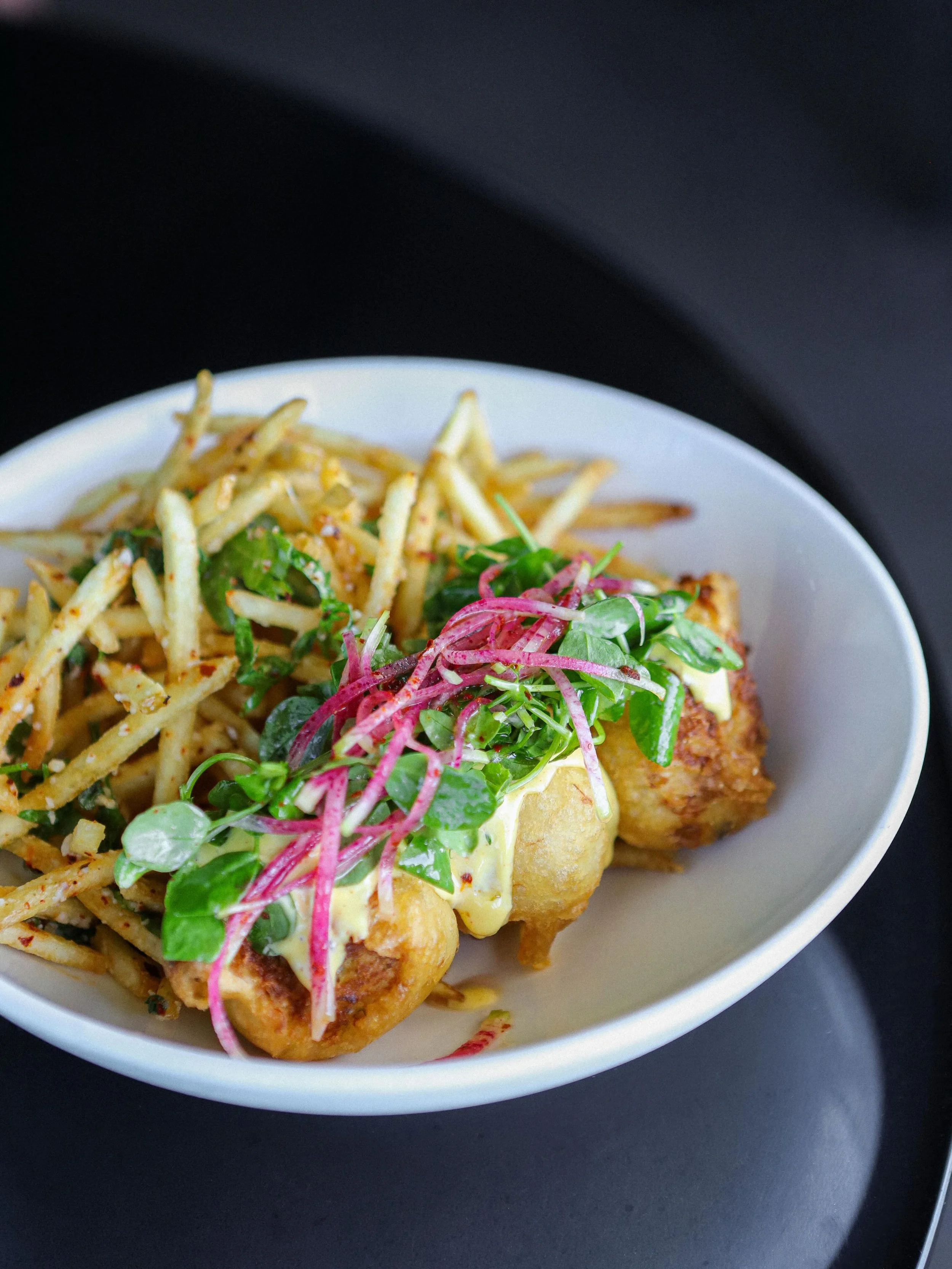 Crab Beignets &amp; Pommes Frites 🦀🍟

Beer Battered Mini Crab Cales, Pommes Frites, Pea &amp; Radish Salad, Paprika &amp; Saffron Mayo.