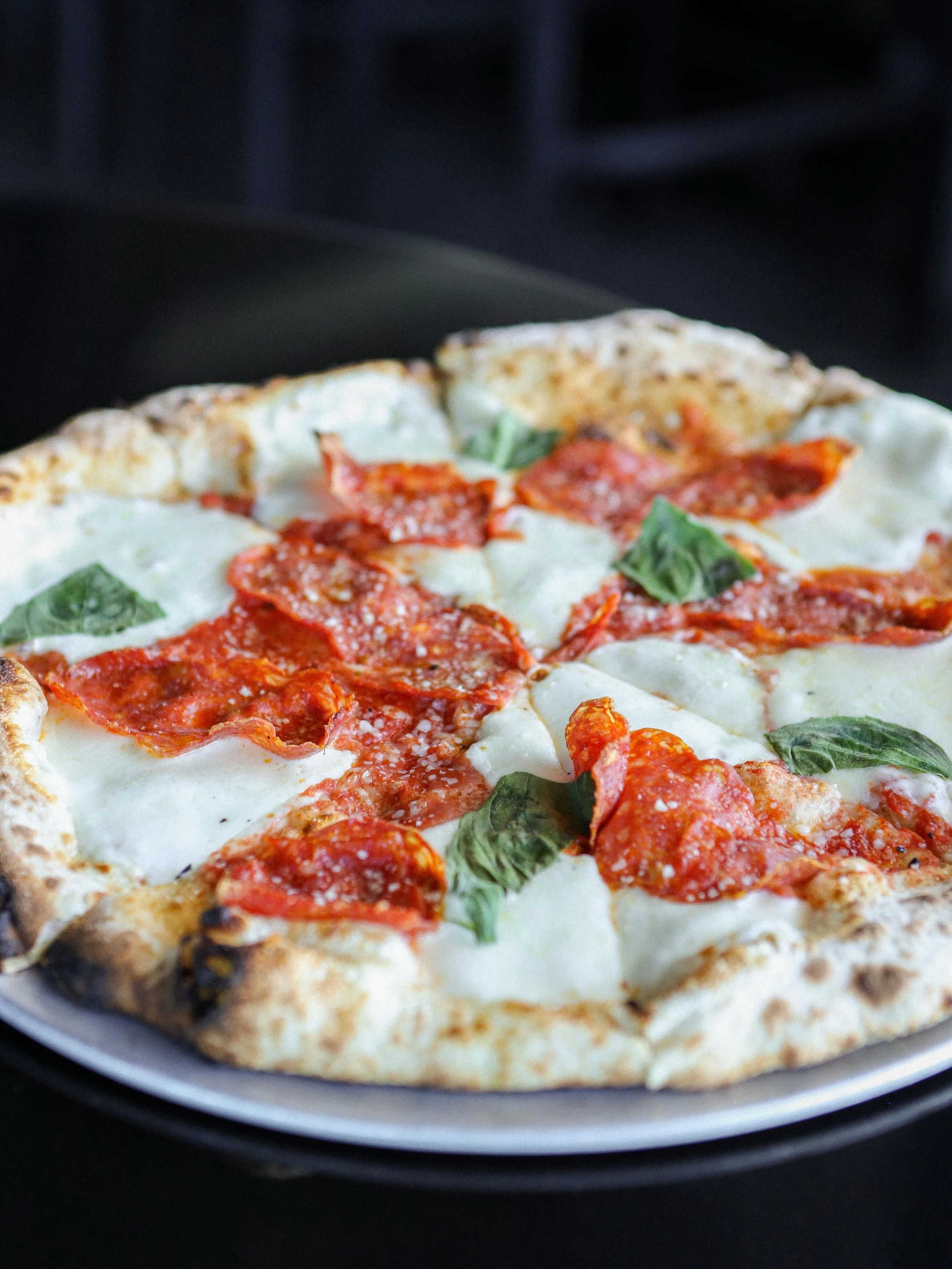 From the Hearth 🔥 

&bull; Calabrese Salami Pizza
&bull; Pork Sausage Pizza
&bull; White Bean &amp; Arugula Pizza (v)

Dining reservations available via OpenTable (link in bio).