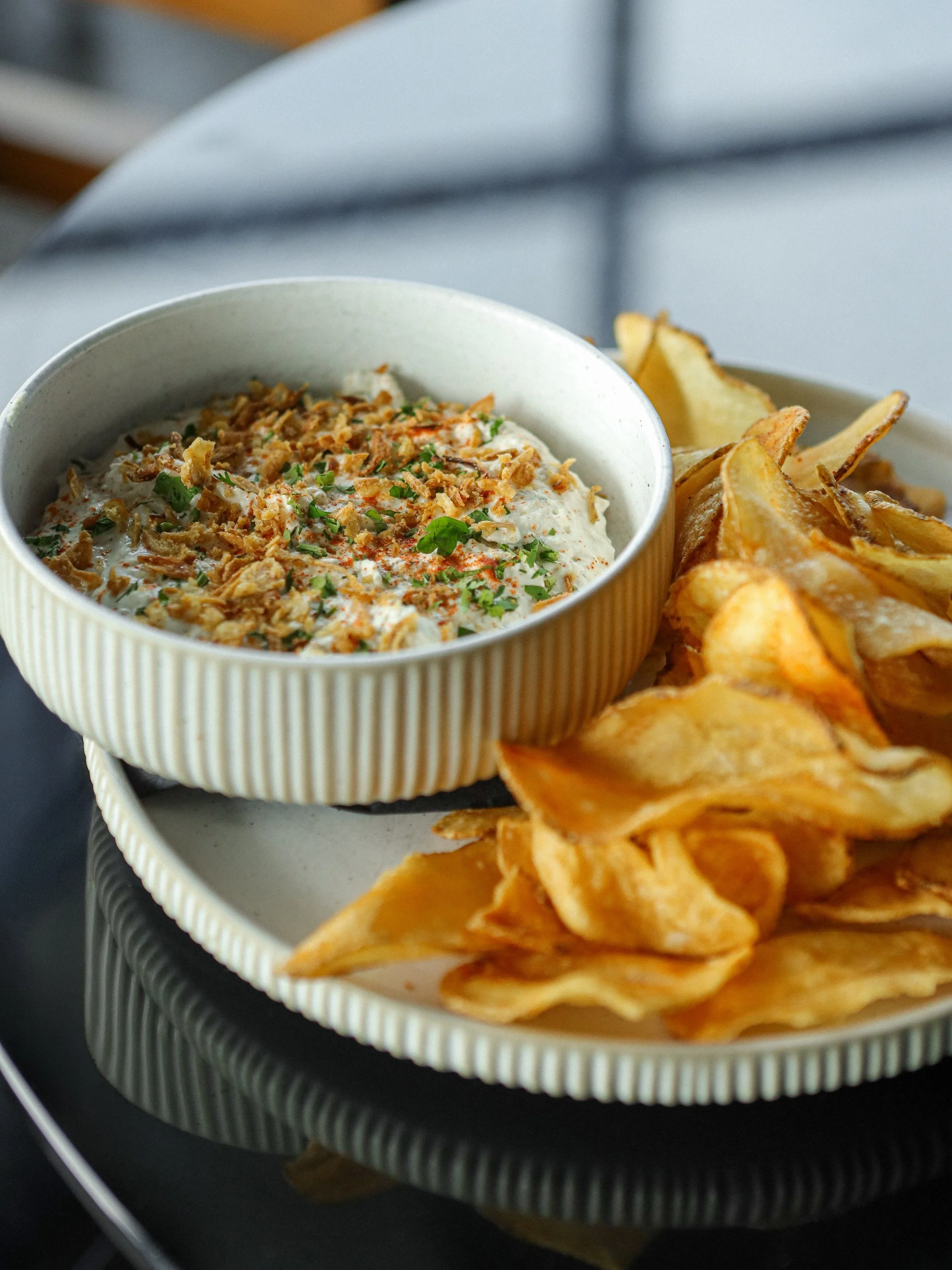 Chips &amp; Dip 🤌

Garlic Dill Pickle Dip
&mdash; Housemade Potato Chips, Whipped Sour Cream &amp; Cream Cheese Blend, Savory Seasoning, Fine Herbs, Crispy Shallots