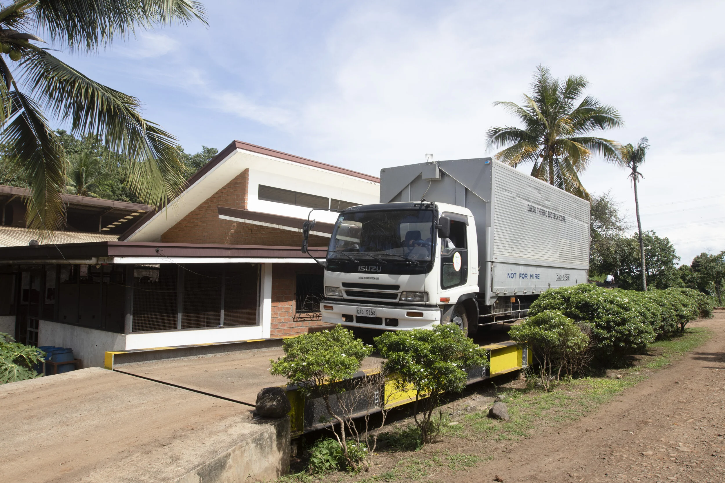One of the DENR-EMB accredited trucks on the truck scale for exit weighing for tare weight determination.
