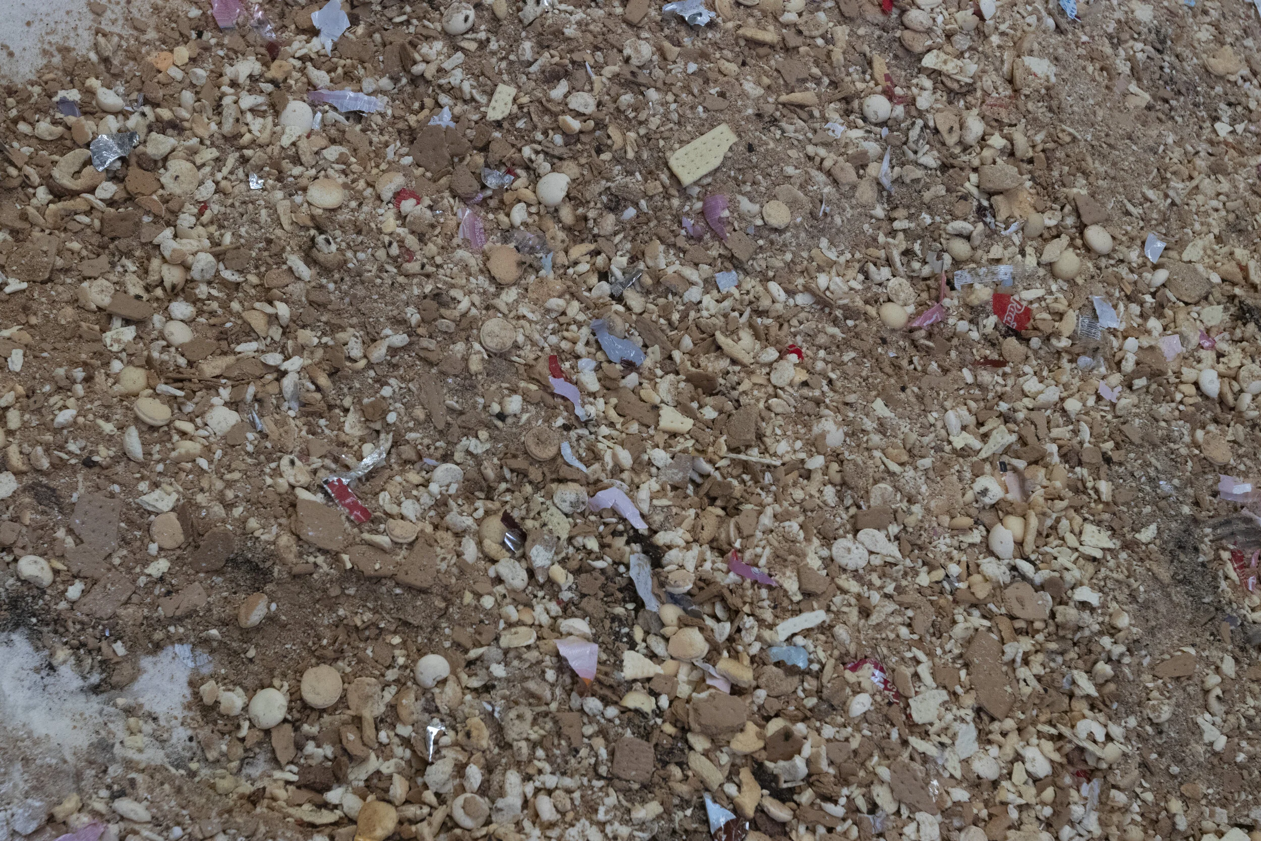 Depackaged food products being prepared for composting