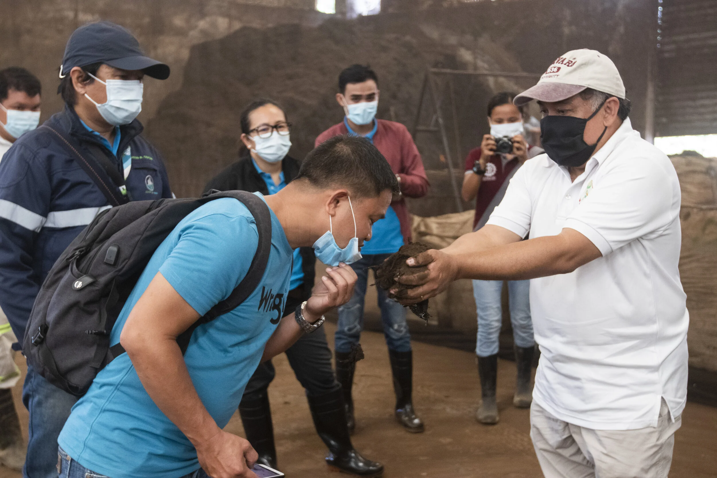 Dr. Bo demonstrating the deodorizing capabilities of the composting process