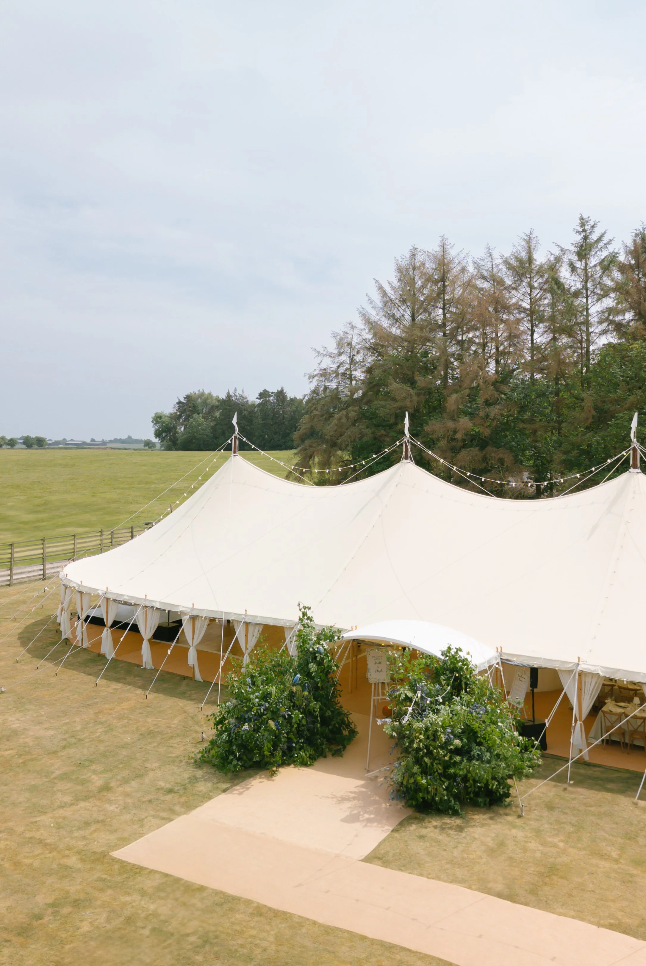 Large wedding marquee floral arch entrance created by daisy hoban floral design
