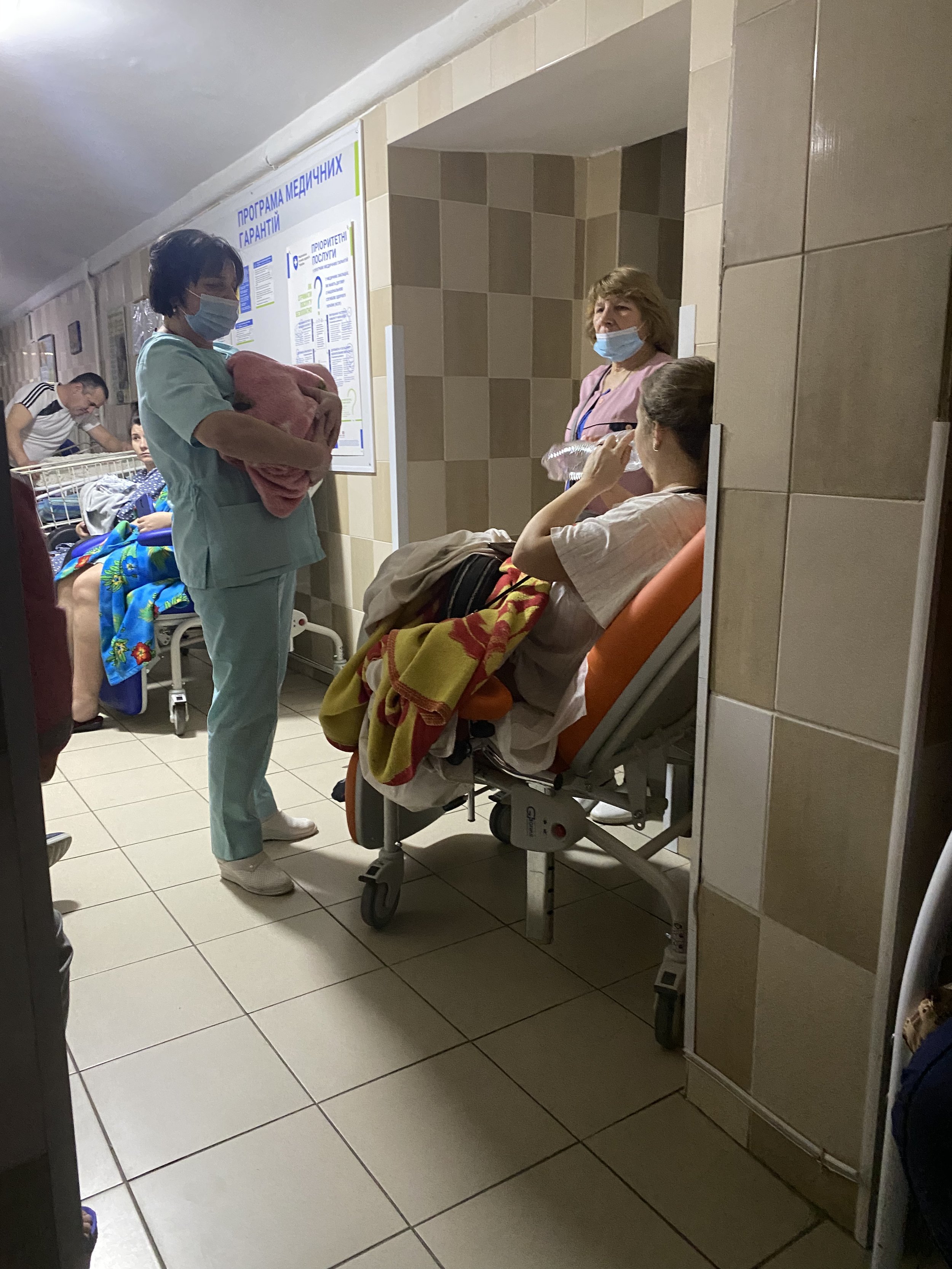Pregnant women descend into a bomb shelter in a maternity hospital in Lviv.