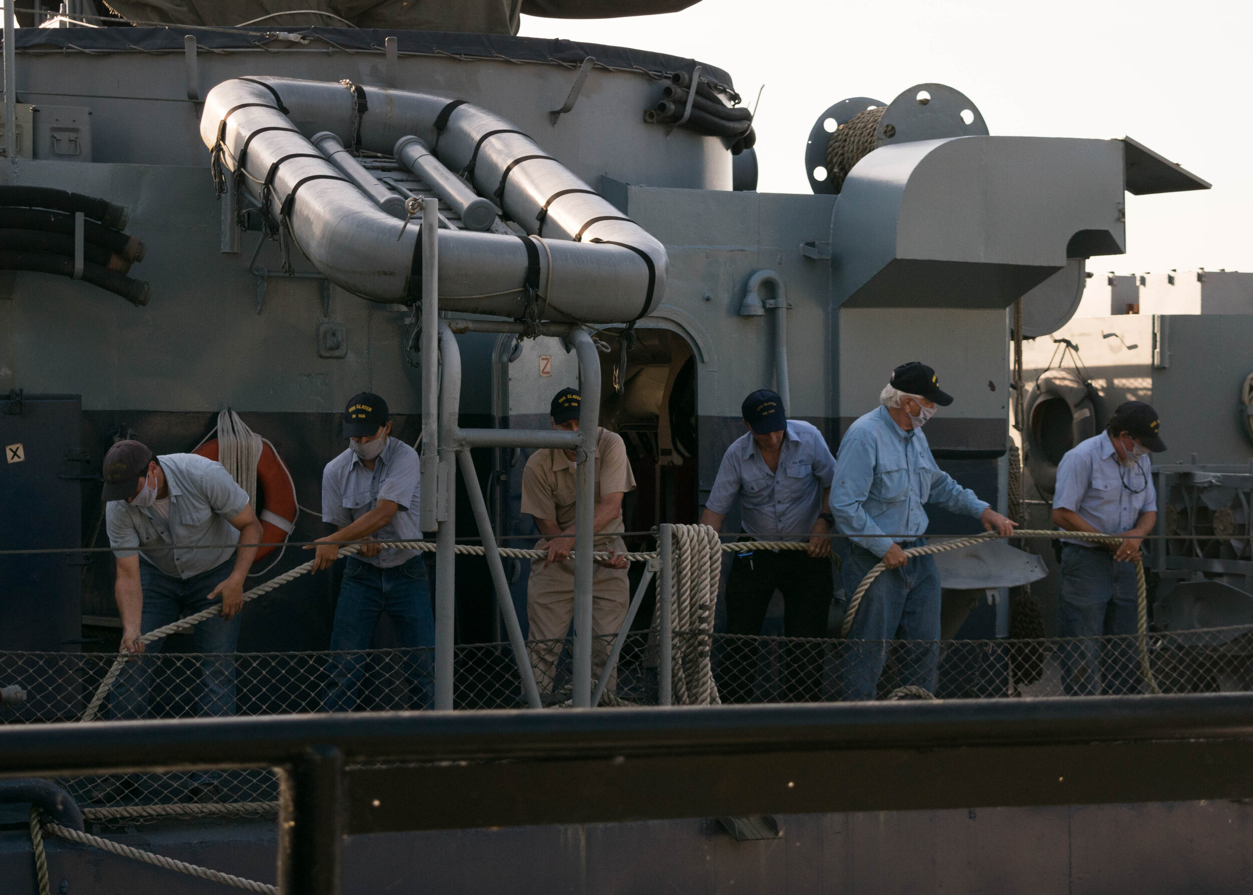 Crew pulling lines. Photo by Michael Schuster