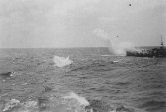JANSSEN fires her K-guns during a two-ship creeping attack, taken from USS HUBBARD DD-748. Photo from uboatarchive.net.