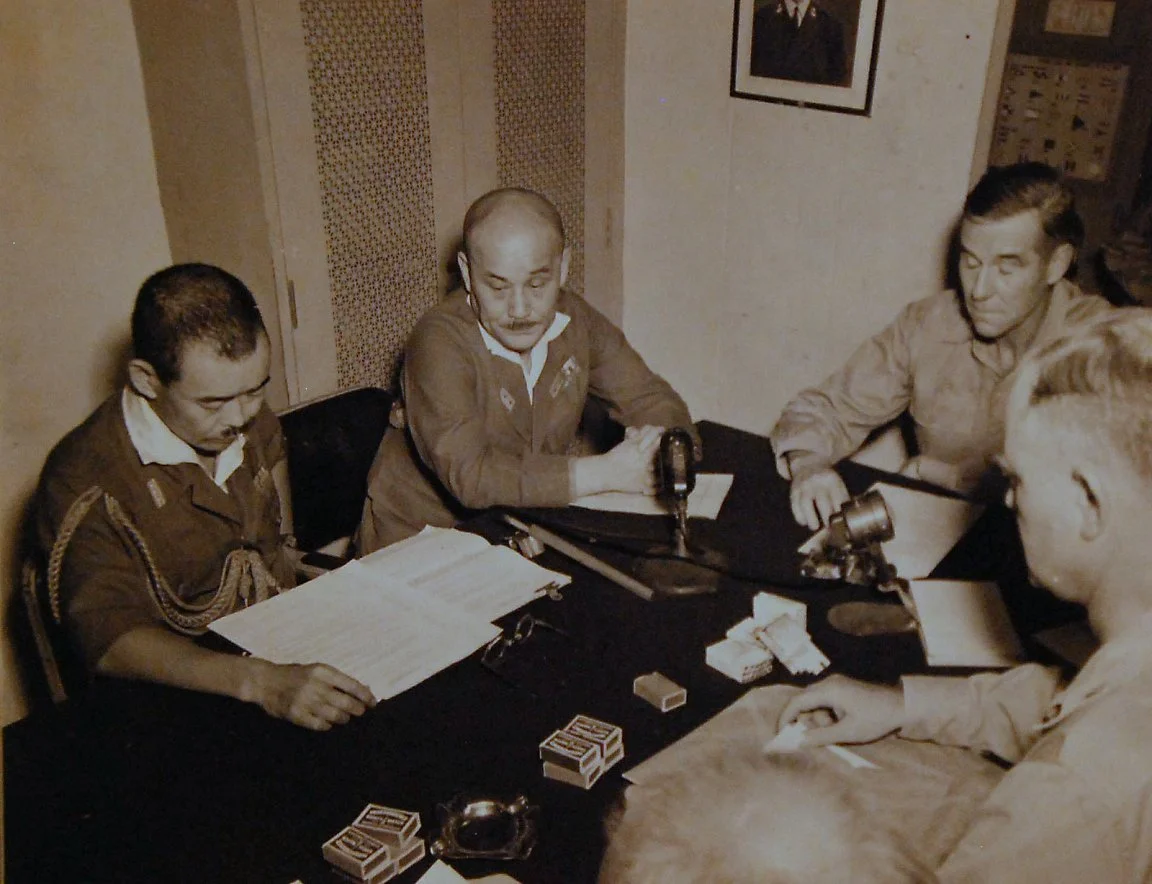 Japanese officers aboard AMICK to sign surrender documents of Babelthamo, Palau. Photo from DEHM.