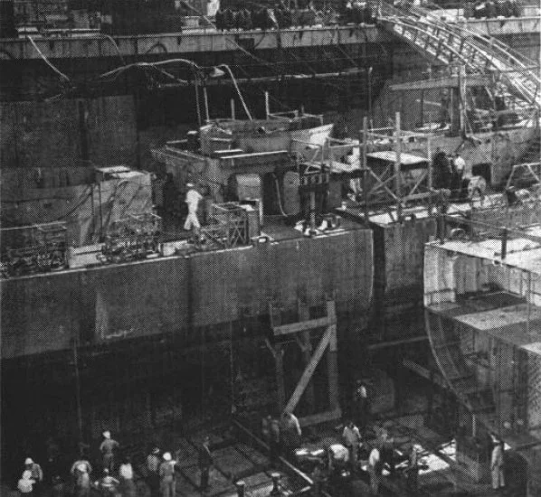 HOLDER and MENGES being connected in the New York Navy Yard. 