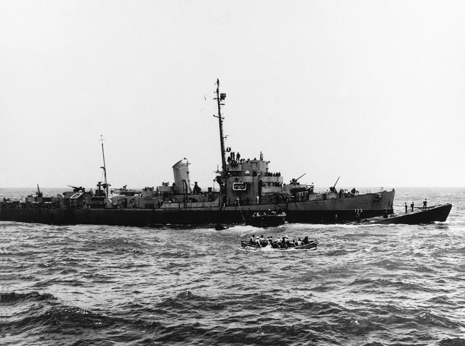 USS PILLSBURY with the captured U-505 alongside, June 1944. 
