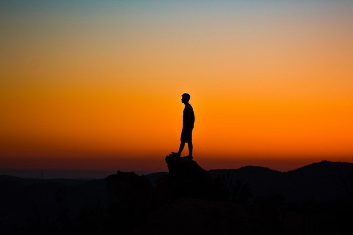 5378656-man-male-rock-sunset-sunrise-silhouette-standing-solitude-alone-outdoors-nature-orange-black-wallpaper-mountain-sky-shadow-free-stock-photos.jpg