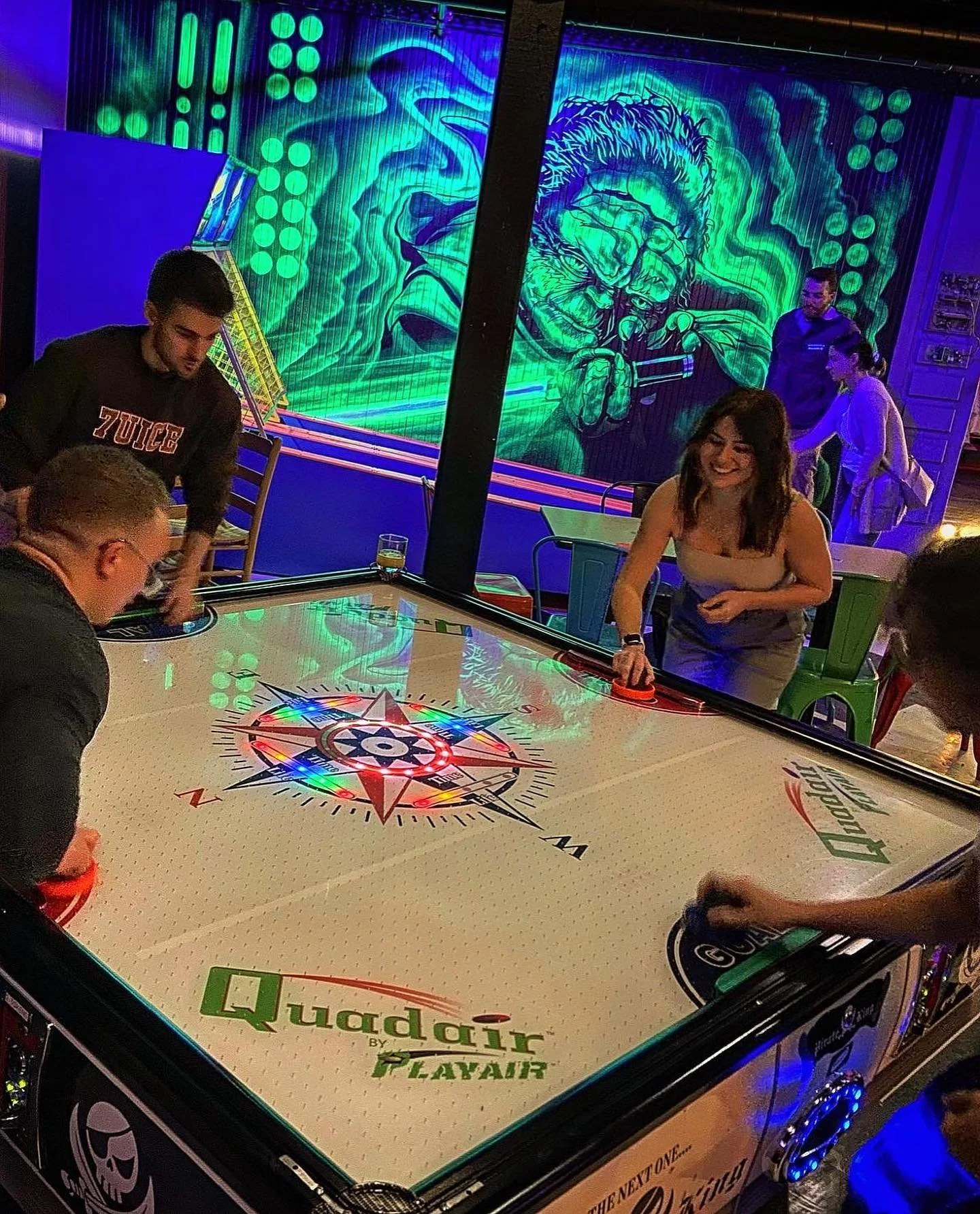 Four person Air hockey.jpeg