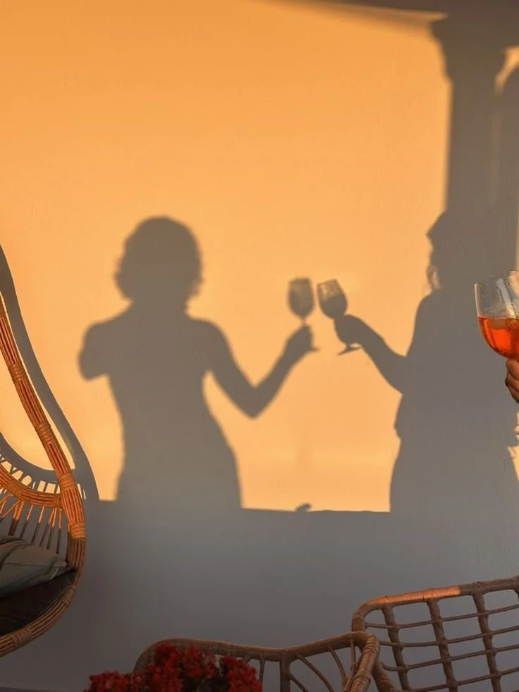 cheers aperol spritz at sunset in greece.jpeg
