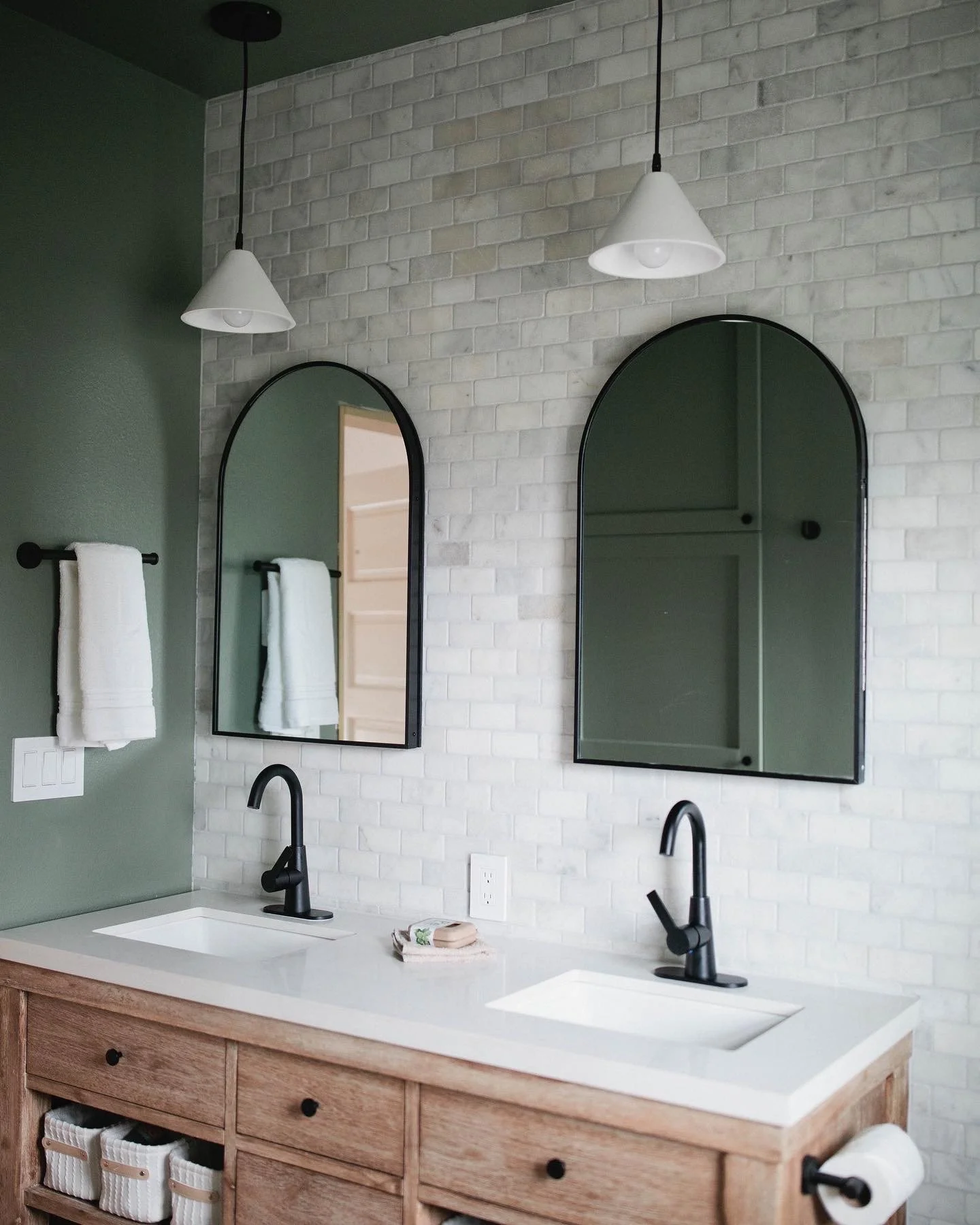 Finish bathroom with green accent wall. Feels like a spa in your own home.