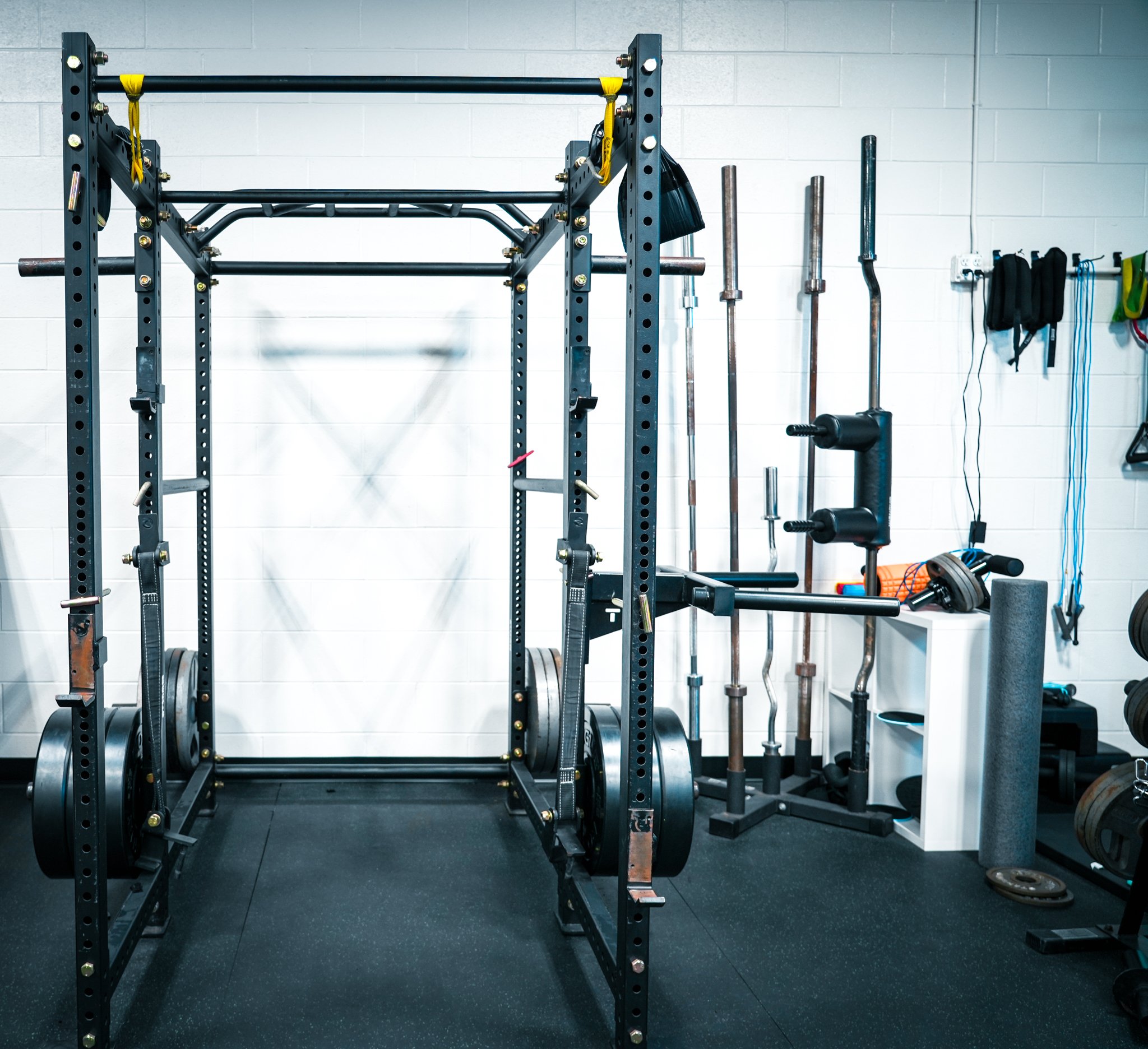 Strength and Conditioning at Movement Art Jit-Jitsu. Power Rack, Olympic Weight Plates, Barbells.