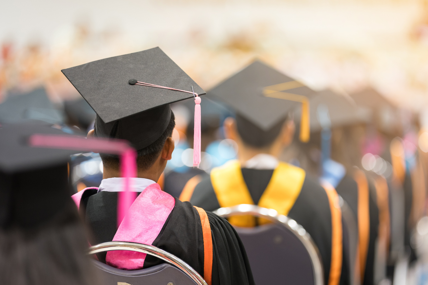 higher education students at graduation