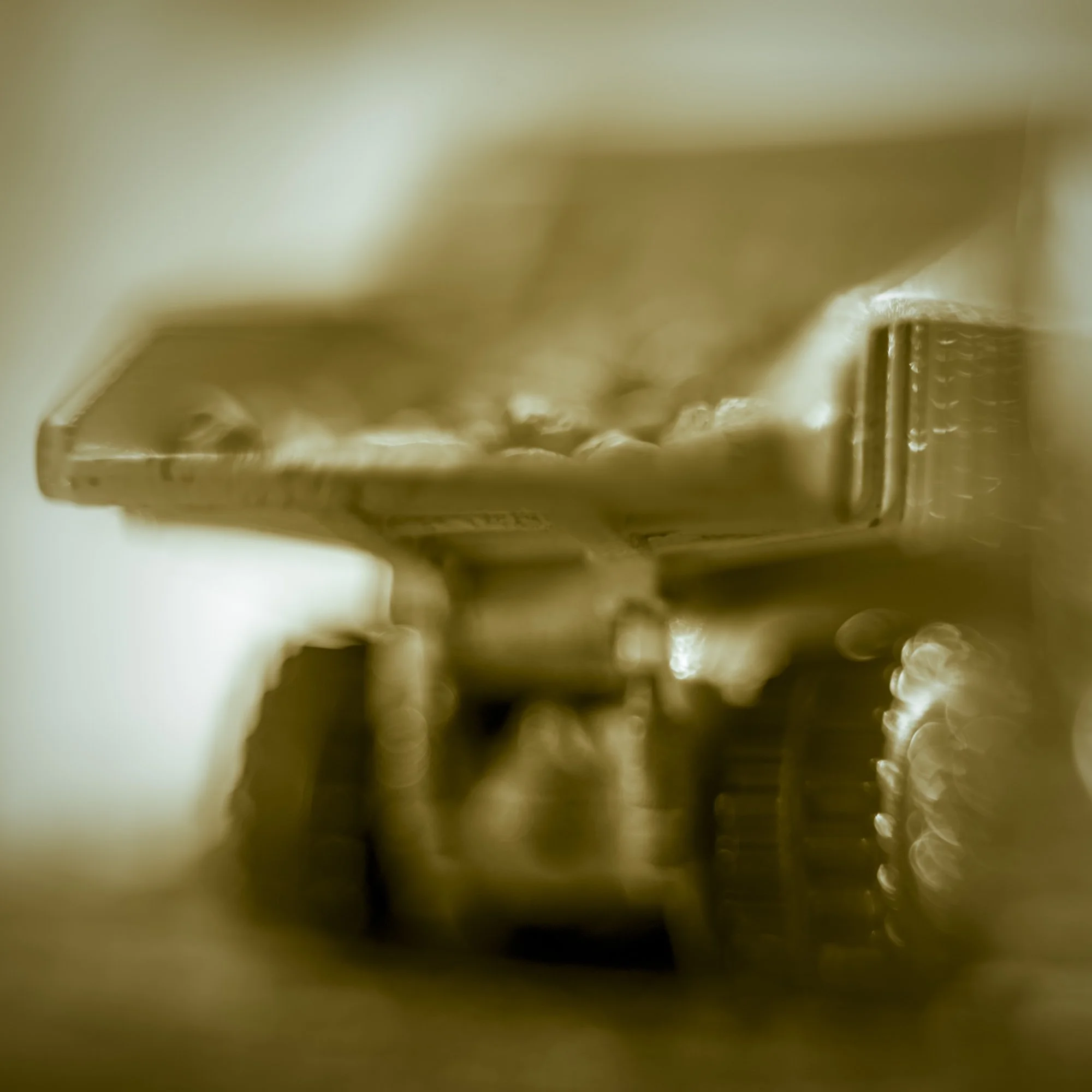 A toy dump truck photographed by Mark Robert Halper.