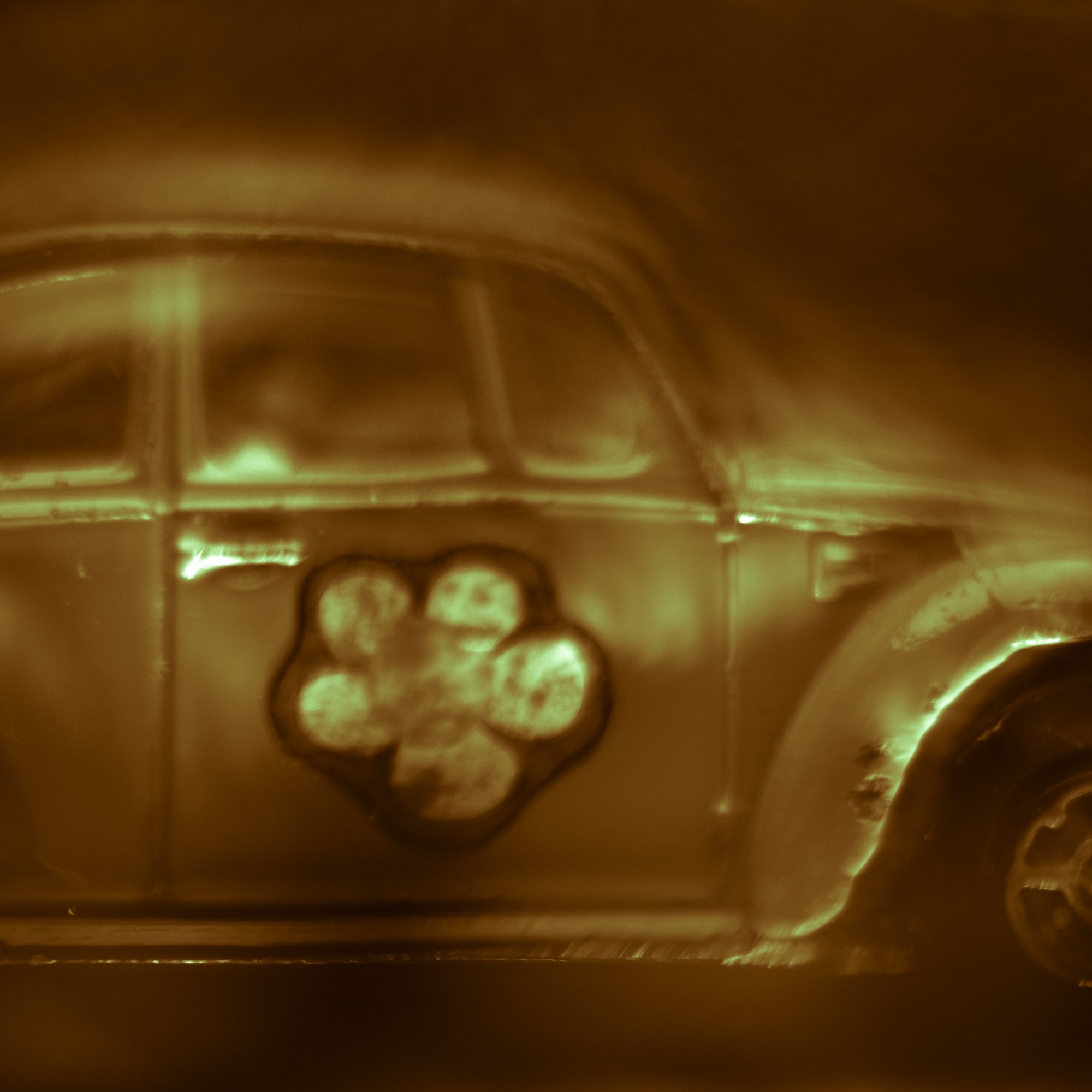 A toy Volkswagen photographed by Mark Robert Halper.