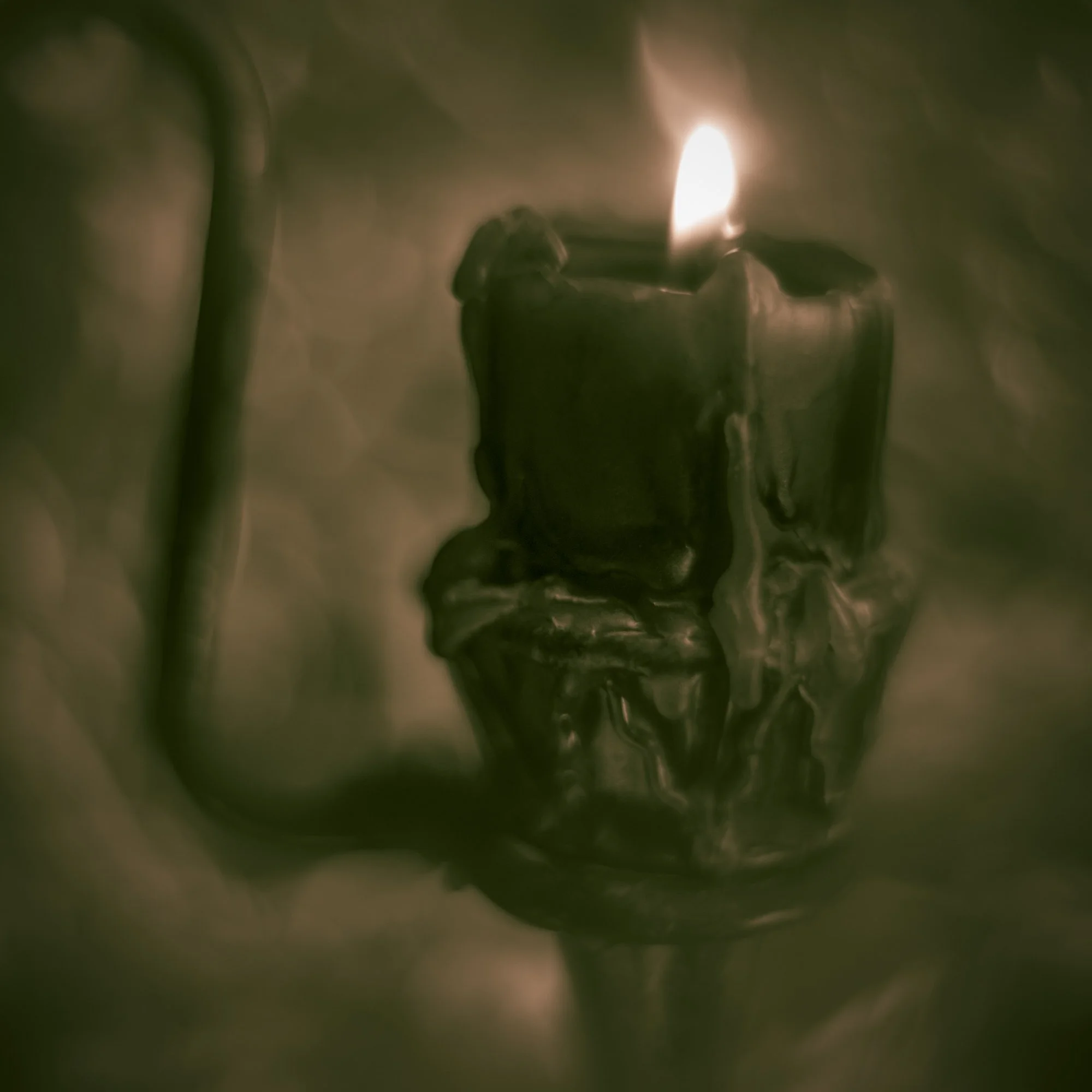 A candle photographed by Mark Robert Halper.