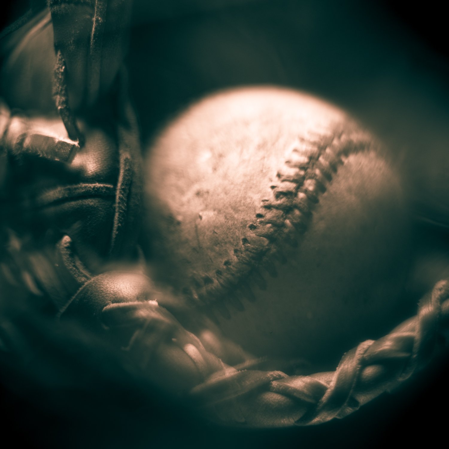 A baseball and glove hold the memory of time spent together.