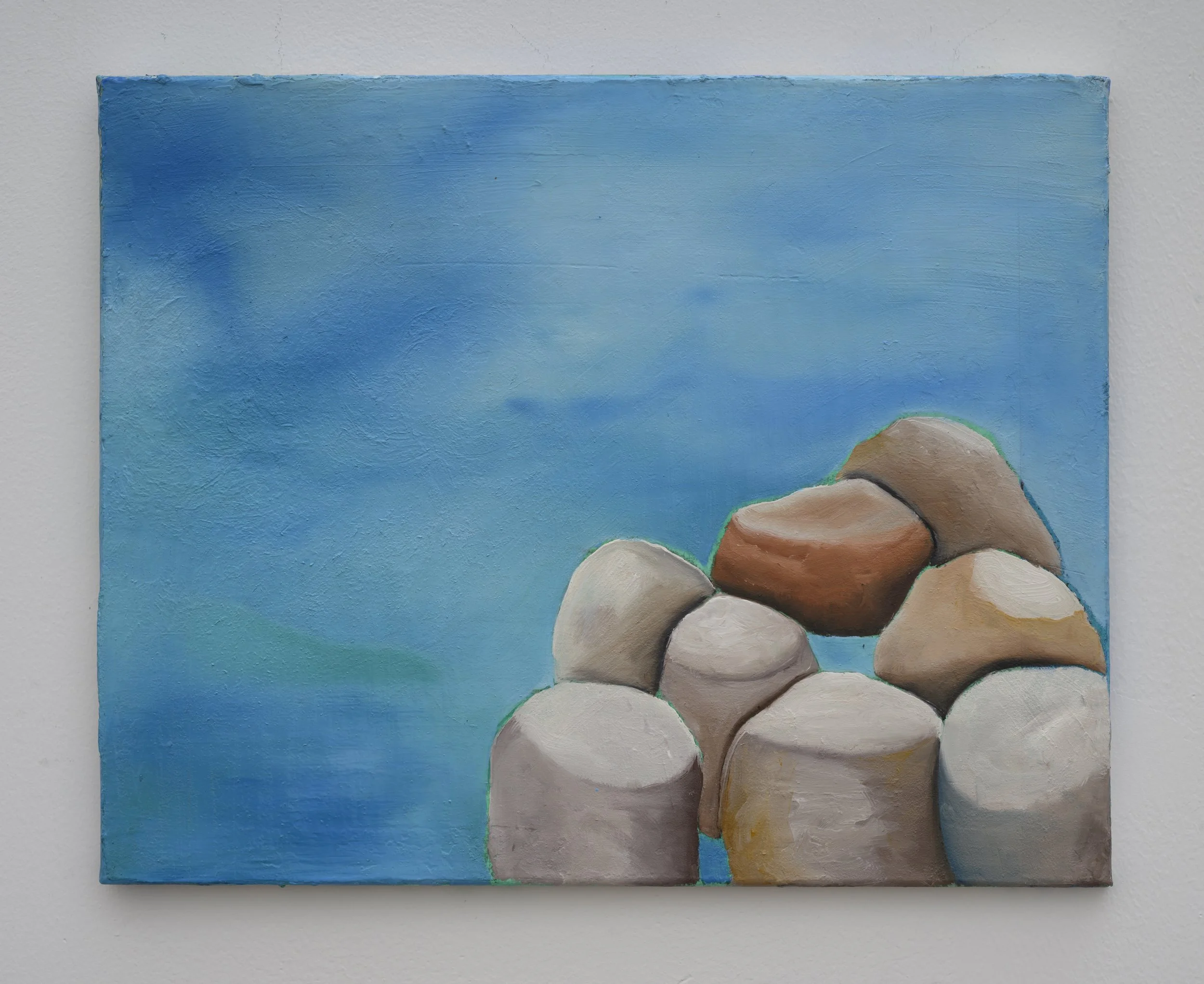 16" x 20" oil painting with a blue background sort of like a sky with a grouping of smooth rock-like shapes with the tops flattened, maybe a place to sit, maybe not at all