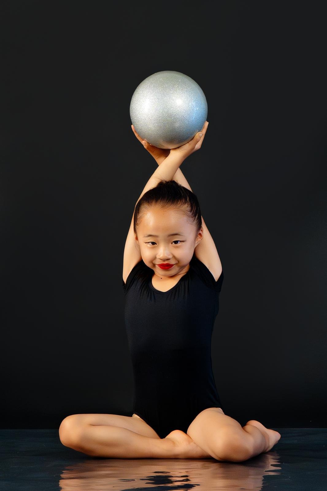 Em with ball.JPG